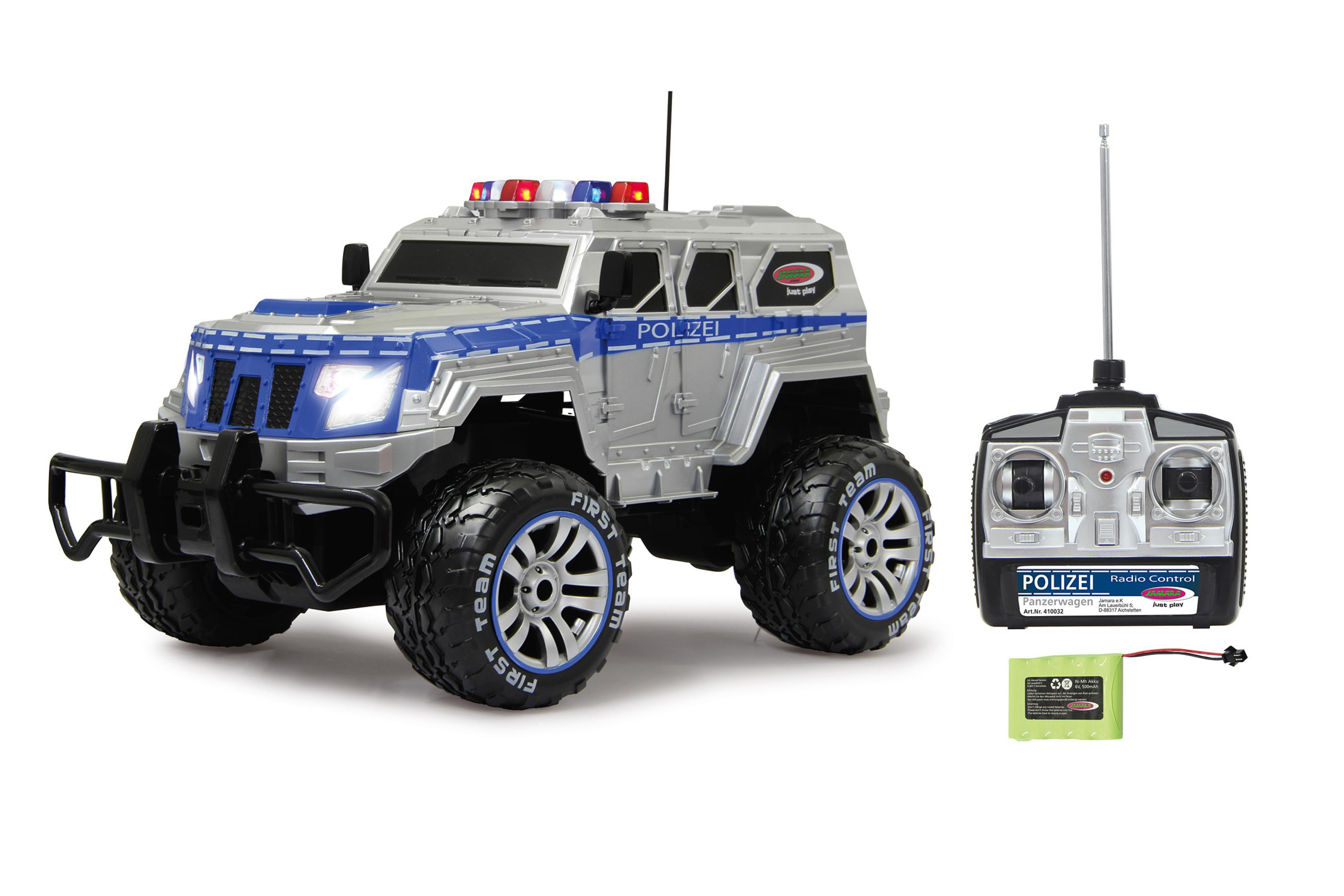 Ein ferngesteuertes Polizeifahrzeug mit Fernbedienung und Akku.