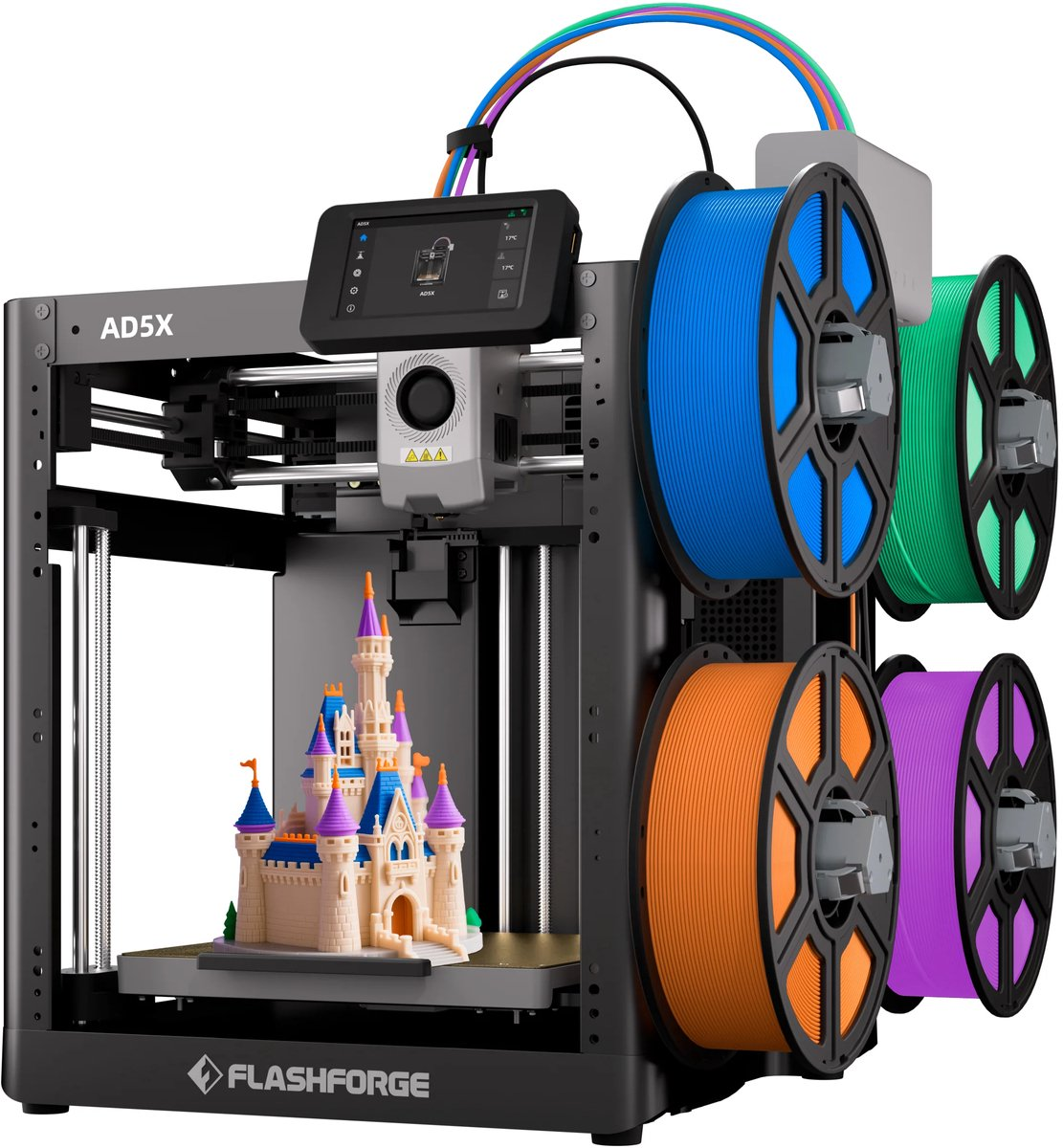 Een 3D-printer print een gedetailleerd kasteelmodel met blauwe, paarse en oranje filamentrollen.