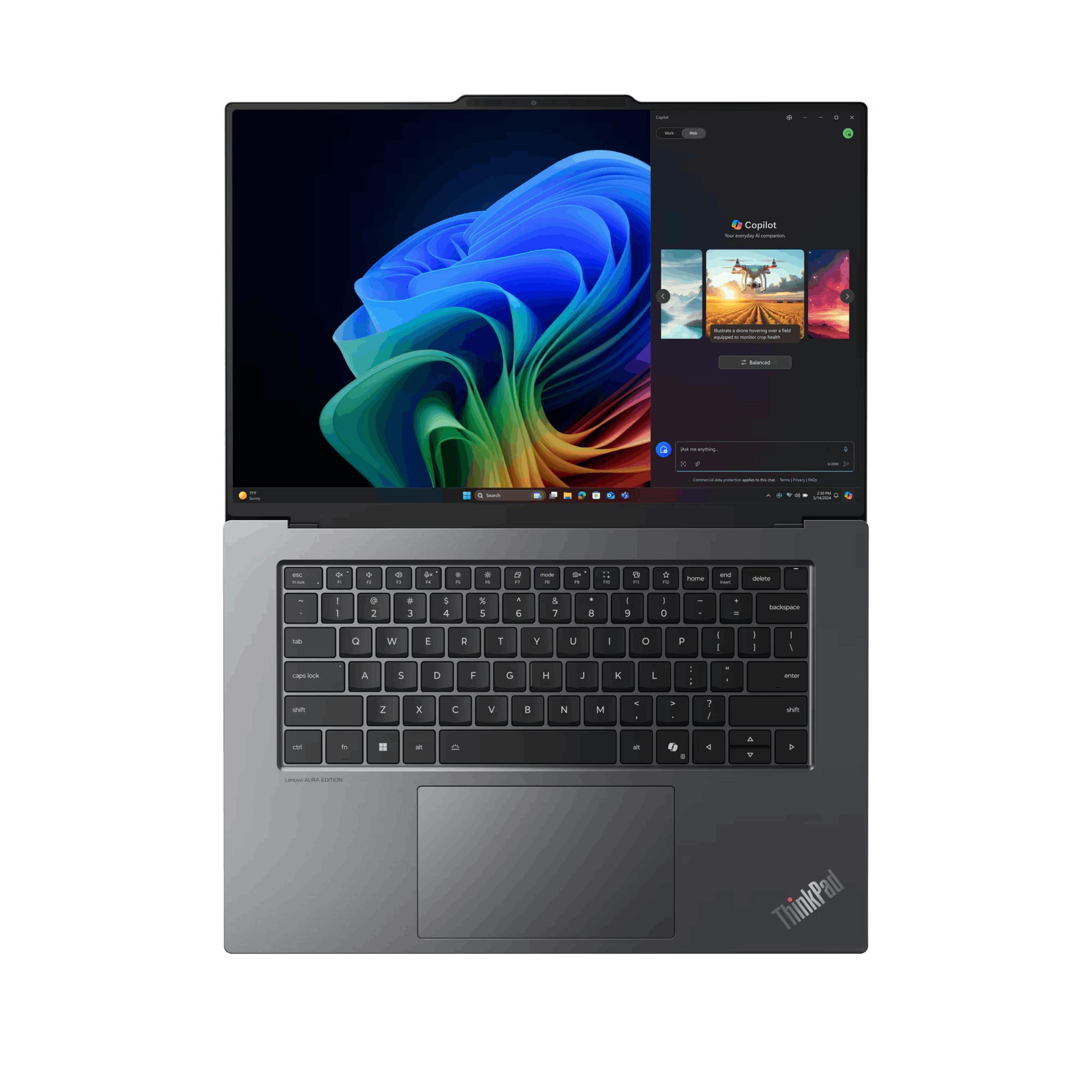 Un laptop con uno sfondo scuro e la finestra Copilot aperta.
