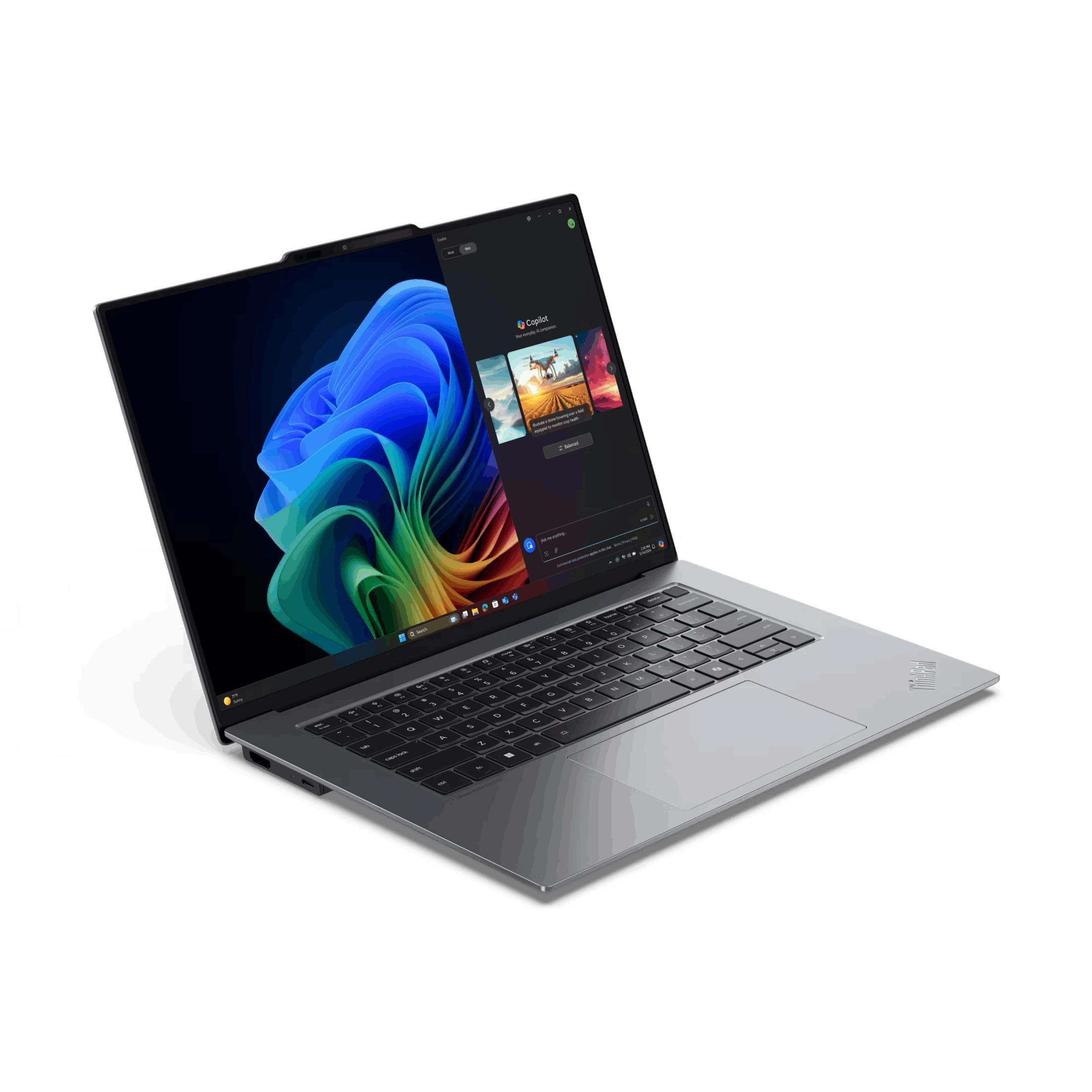 Un laptop aperto mostra uno sfondo colorato e l'app Copilot.