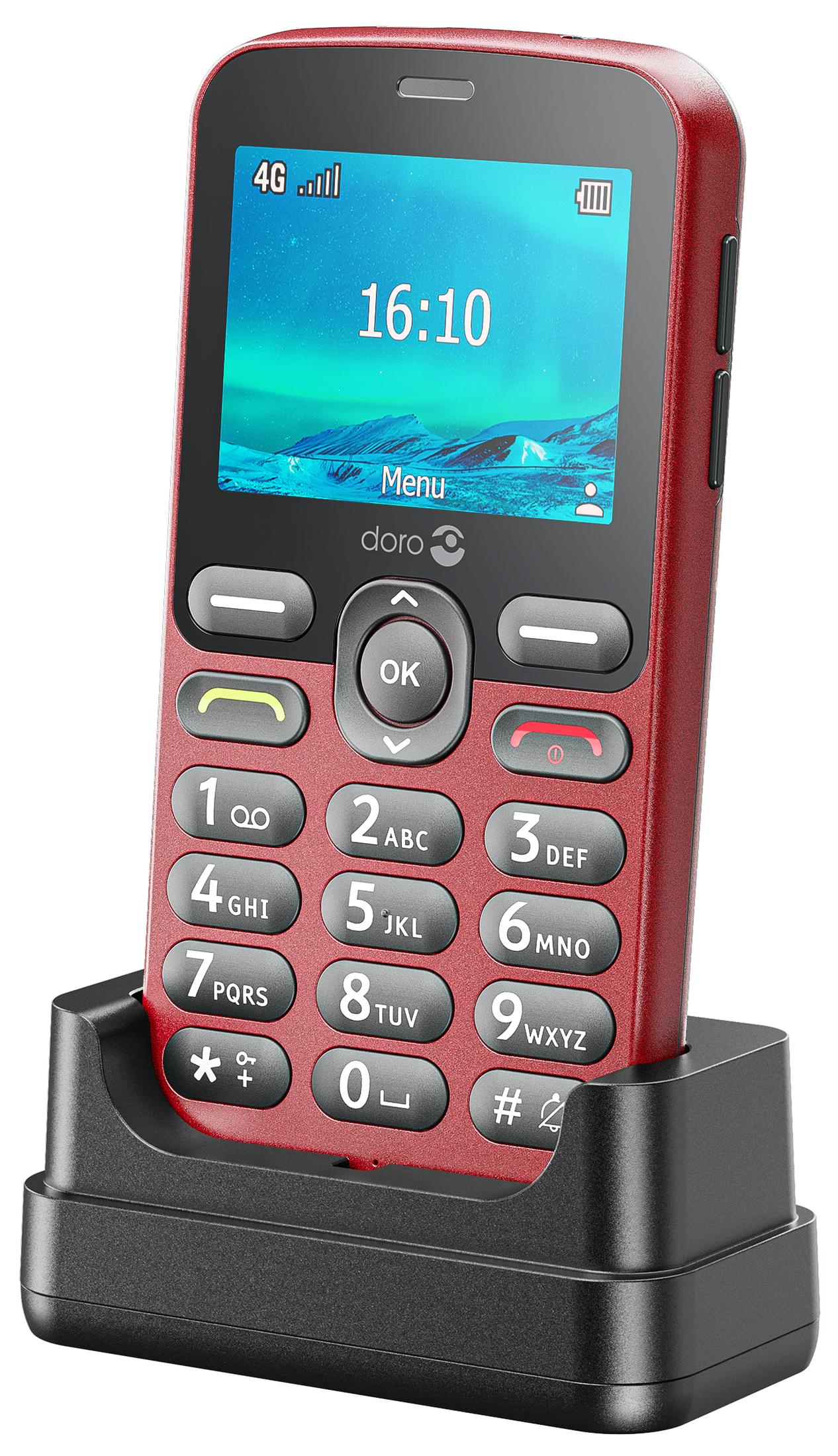 Un telefono cellulare rosso Doro 4G è nella sua base di ricarica. Lo schermo mostra 16:10.