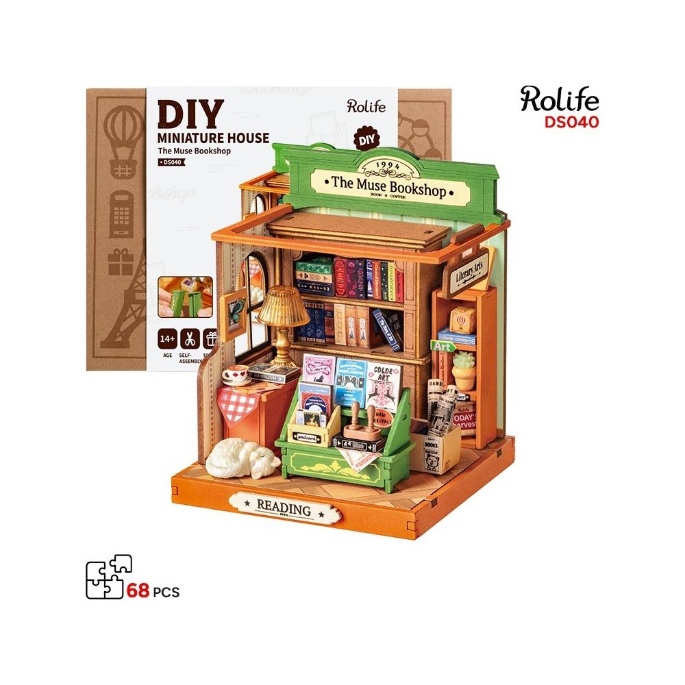 Kitaplar, lamba ve ahşap tabanda uyuyan köpek içeren DIY minyatür kitapçı modeli.