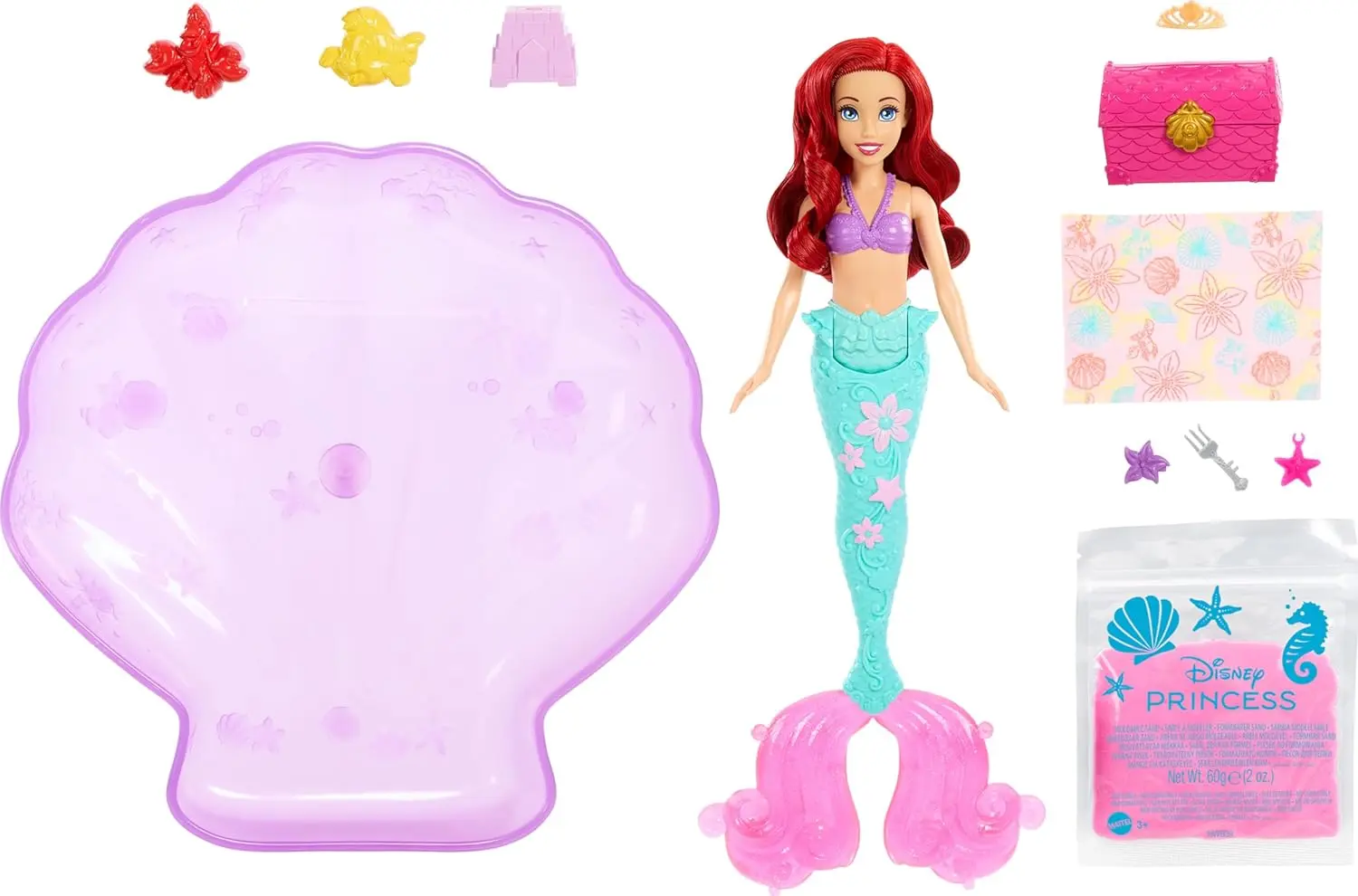 Muñeca Ariel con accesorios: concha, cofre, arena, estrella.