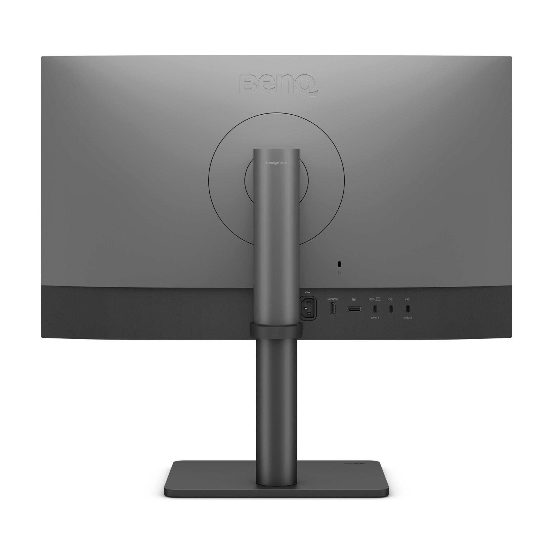 Parte posterior de un monitor gris con soporte y puertos.