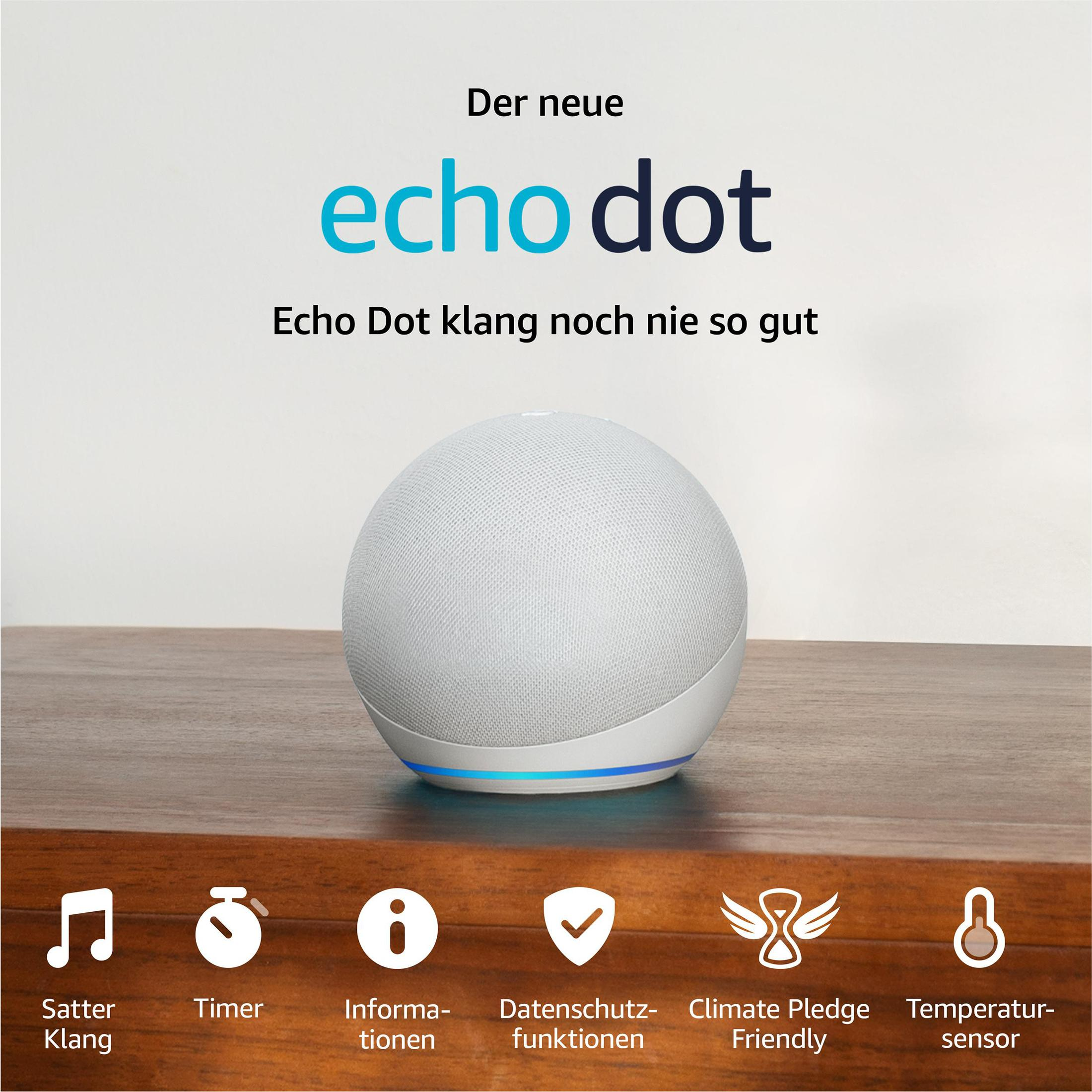 Biały Echo Dot stoi na drewnianym stole z ikonami poniżej.