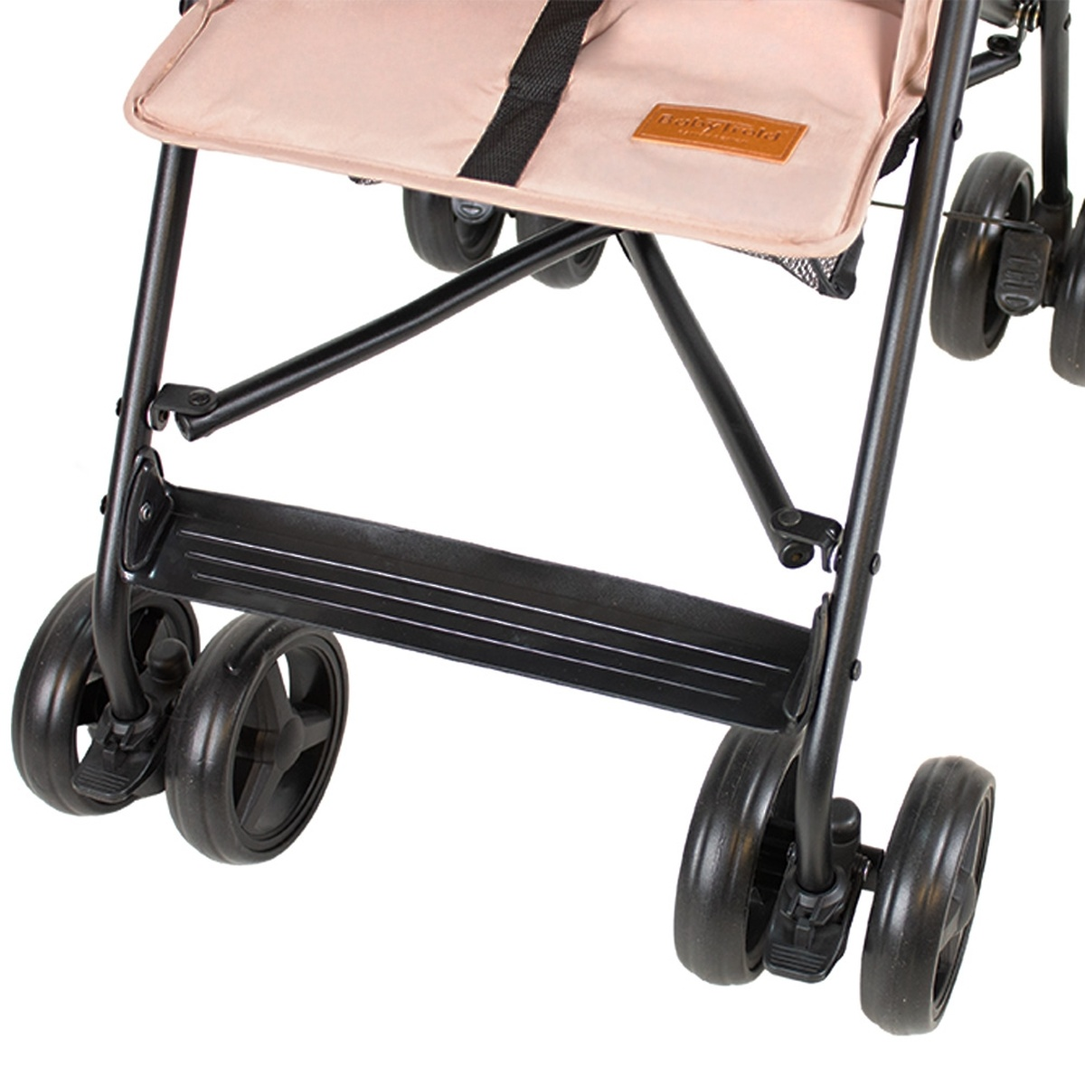 Nahaufnahme des schwarzen Rahmens und des pinken Stoffkissens eines Kinderwagens mit Rädern.