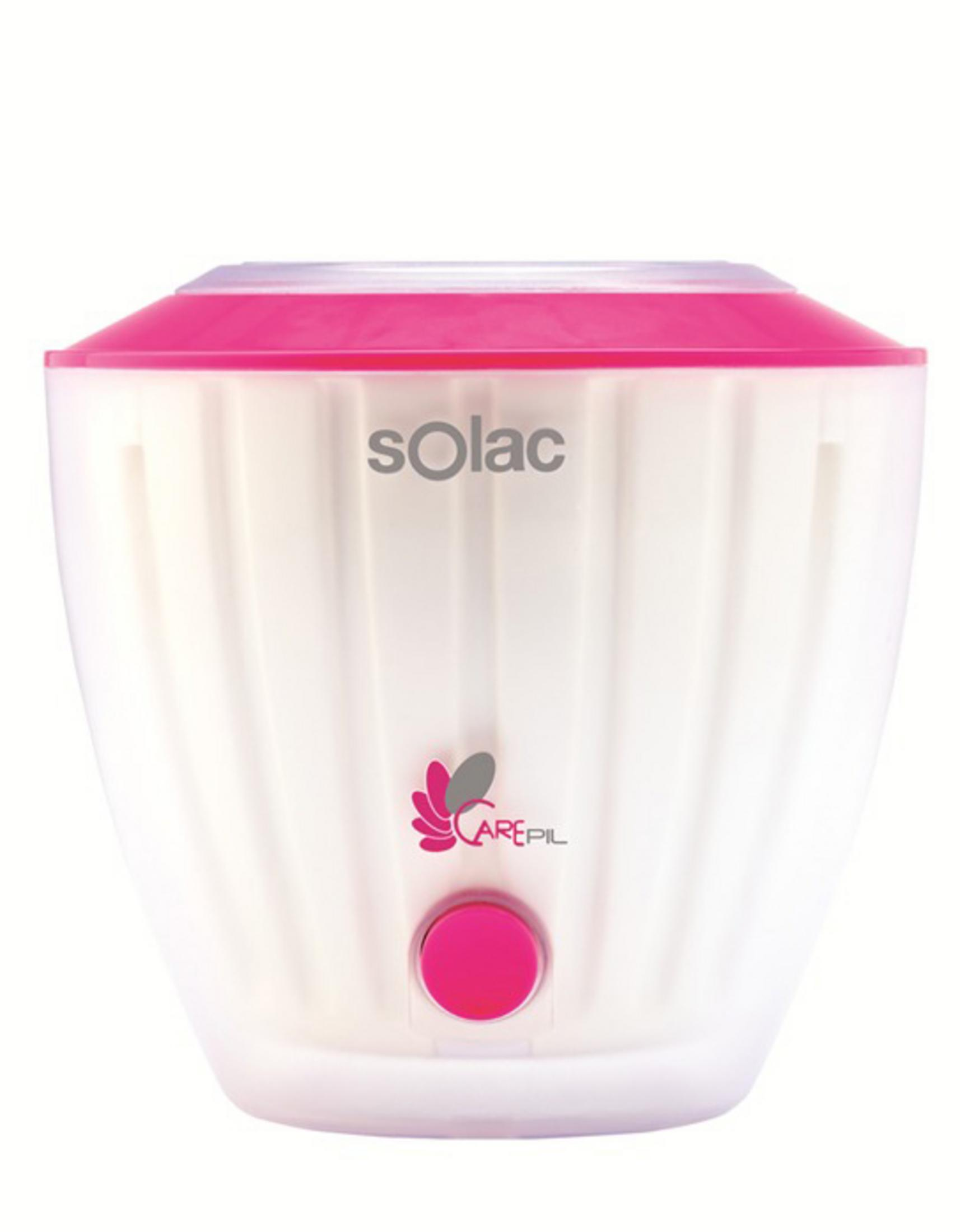 Un calentador de cera blanco con acentos rosas y el logo de Solac.