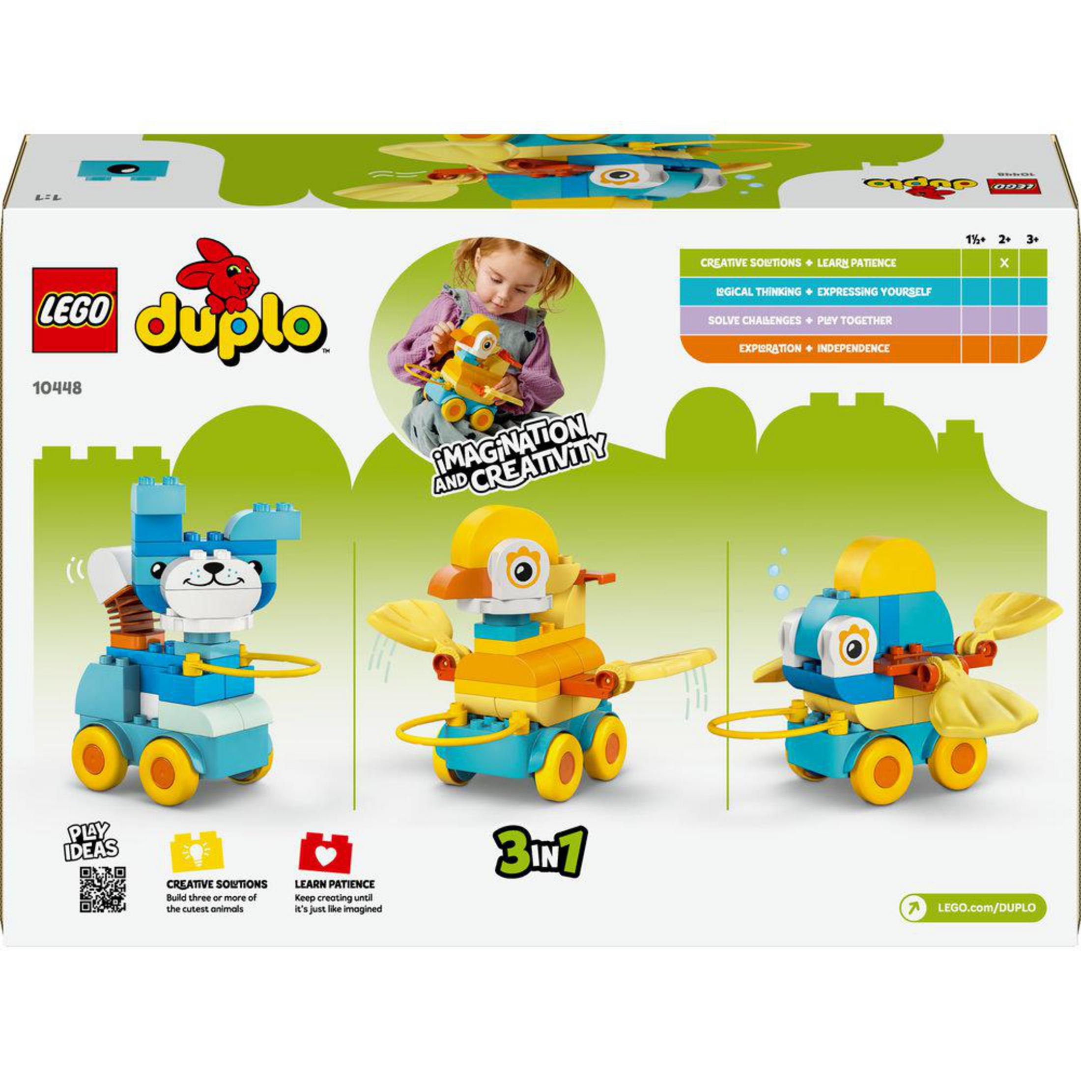 Pudełko Lego Duplo z trzema kolorowymi zabawkami zwierzątek: kot, kaczka i ptak.