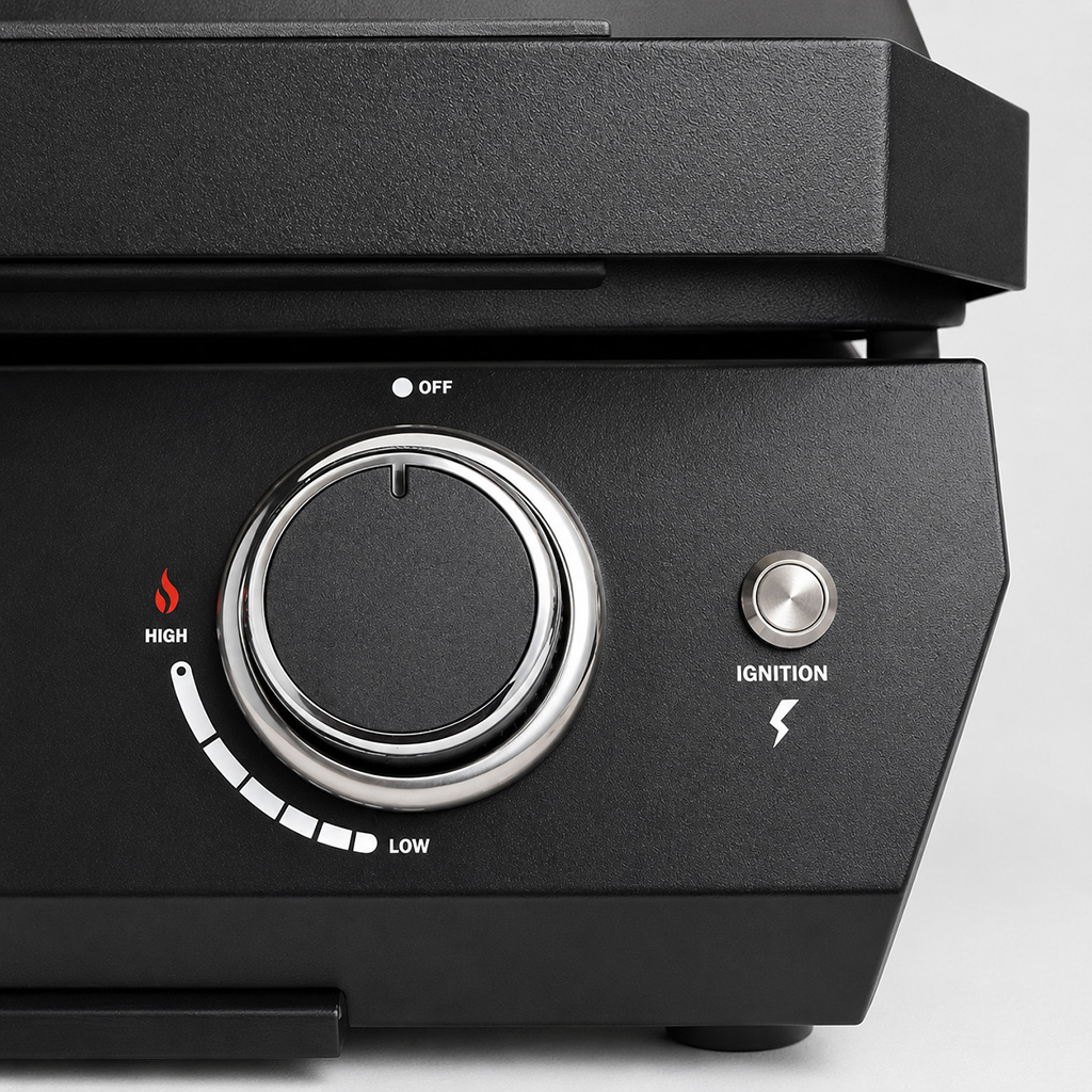 Zwarte grill met temperatuurregelknop en ontstekingsknop.
