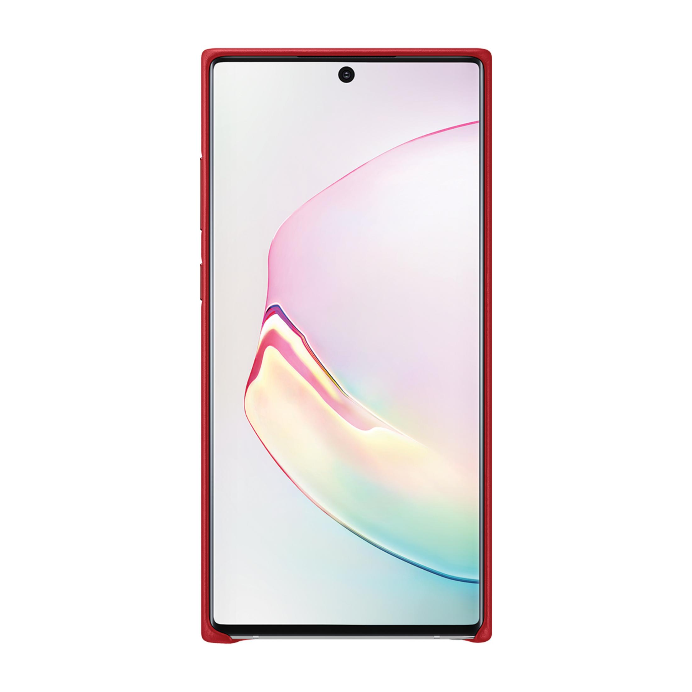 Uno smartphone rosso con sfondo colorato e fotocamera anteriore.