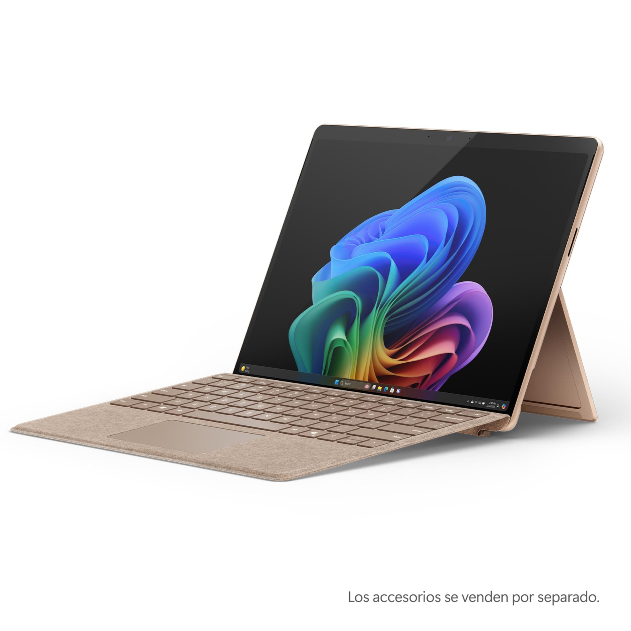 Un laptop dorato con tastiera e cavalletto, che mostra uno sfondo colorato.