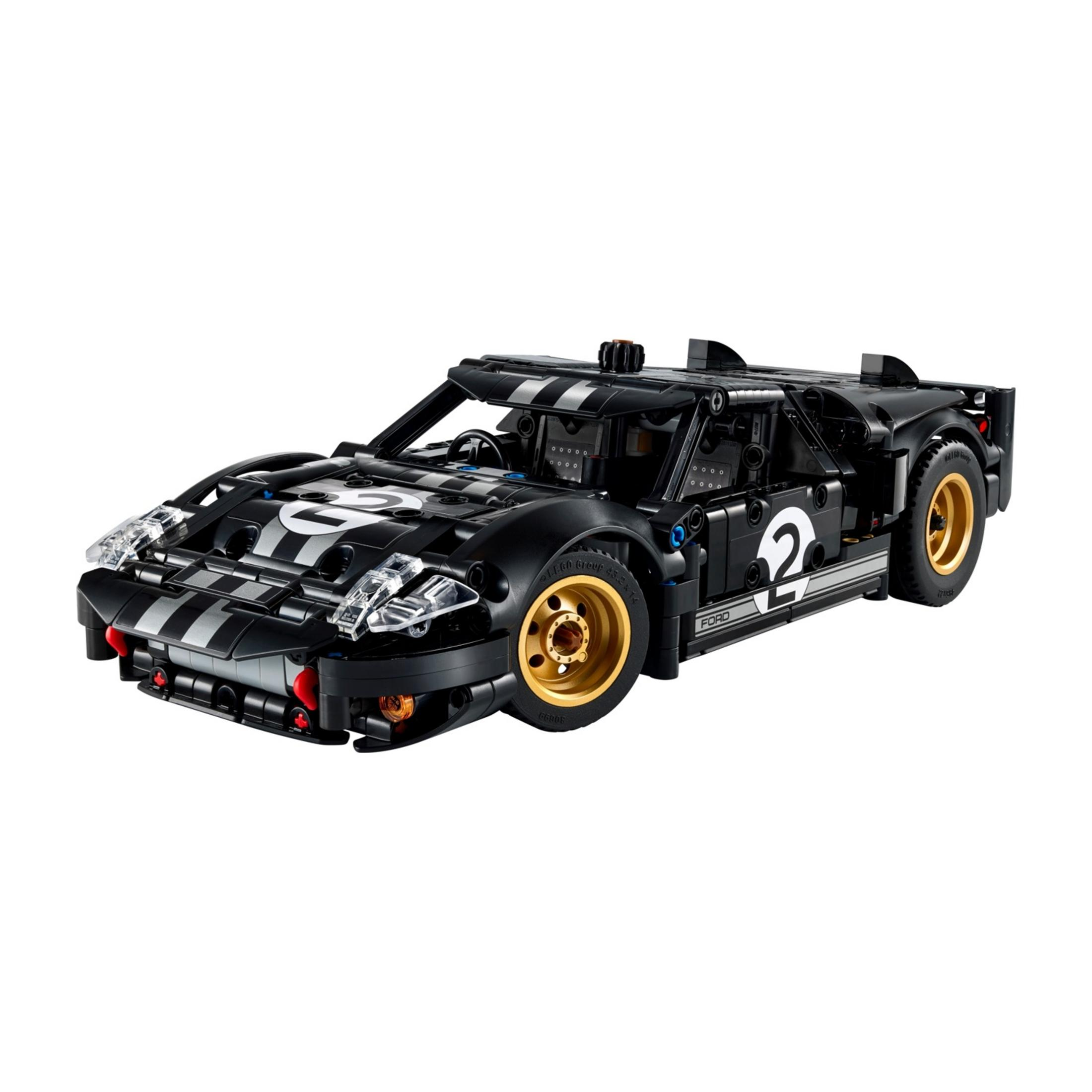 Un coche de carreras Lego negro con rayas plateadas y el número 2.