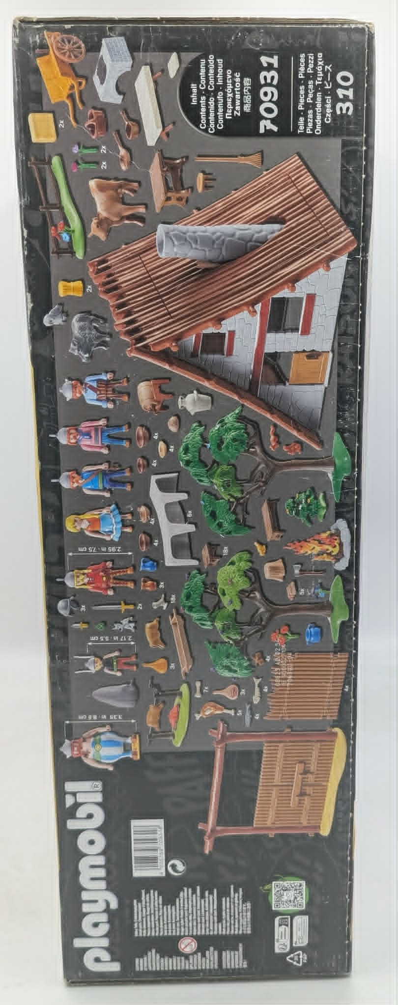 Playmobil-Box mit Figuren, Tieren, Baumhaus und Zubehör.