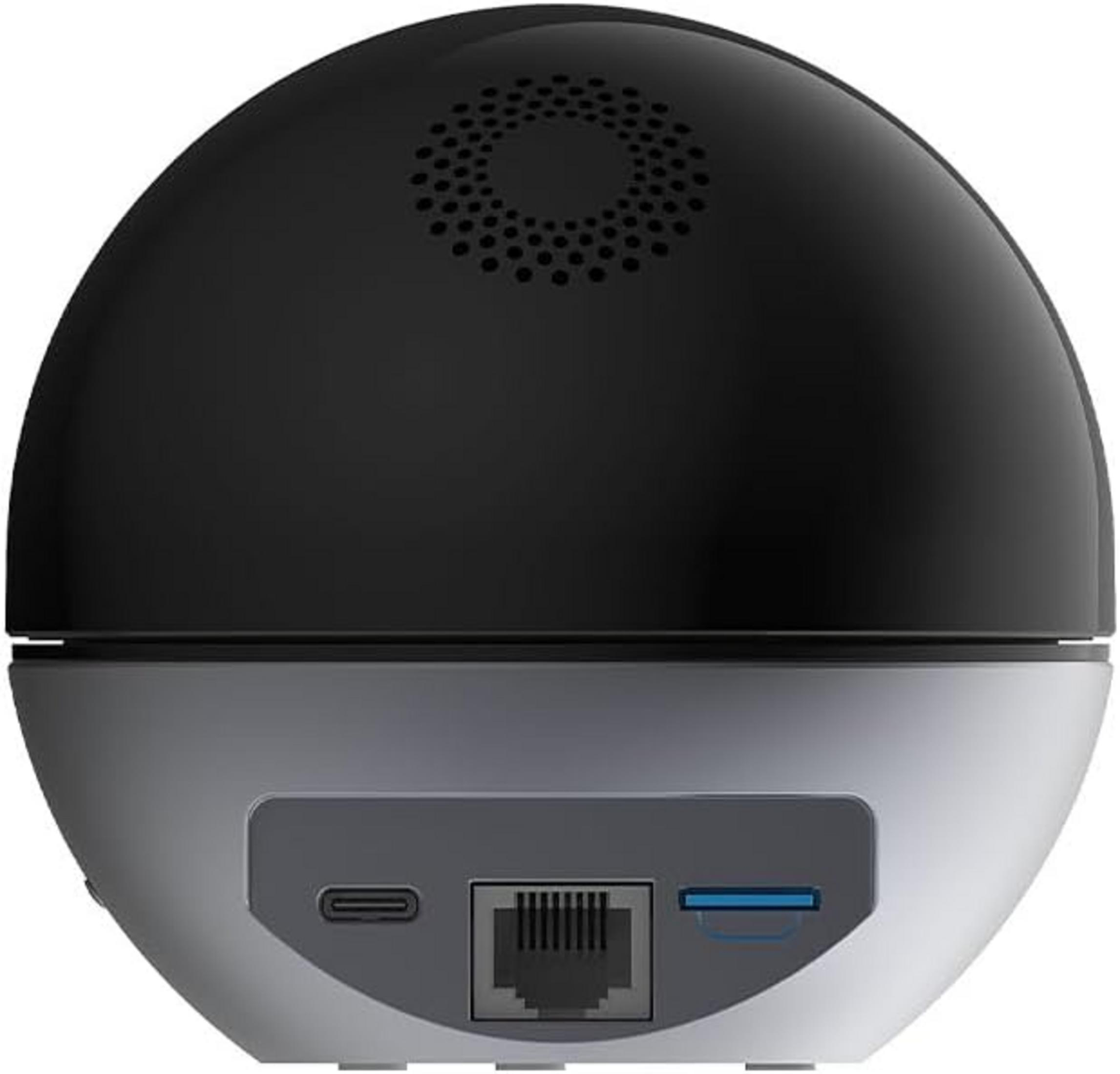 Urządzenie kuliste z czarną górą, portami USB-C, Ethernet i kartą SD.