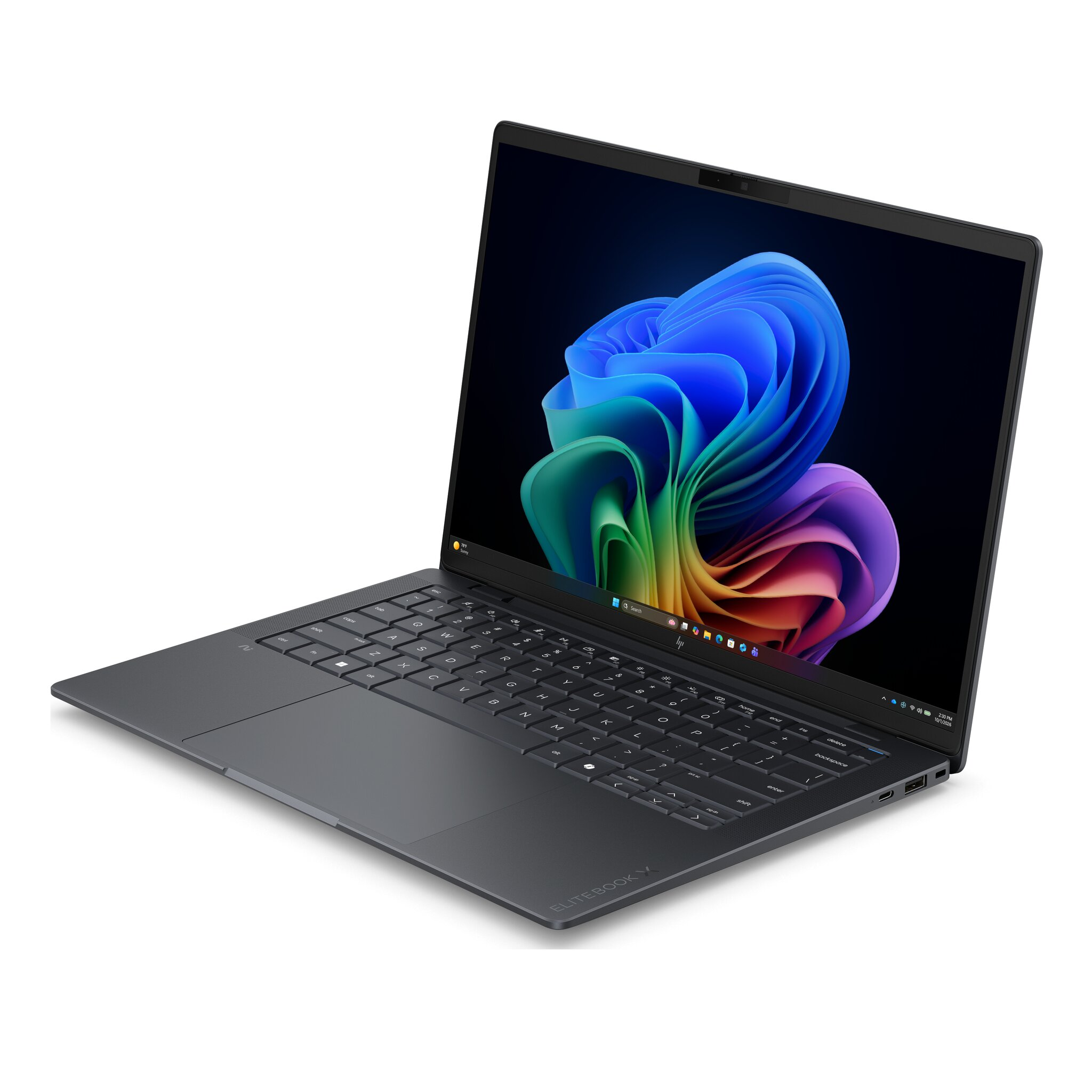 Un laptop scuro con tastiera illuminata e sfondo colorato sullo schermo.