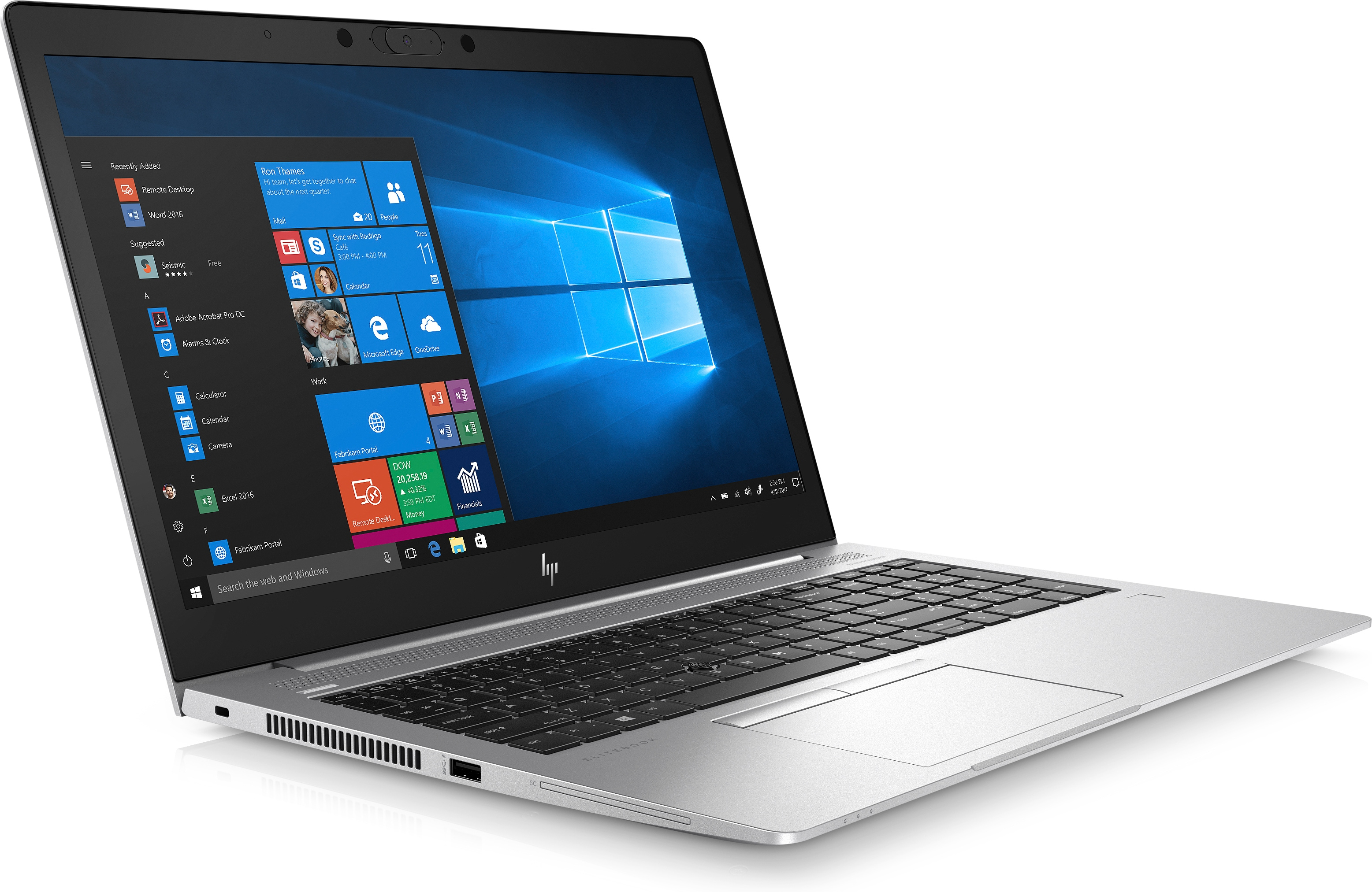 Ein silberner Laptop mit einem geöffneten Windows-Bildschirm und Tastatur.