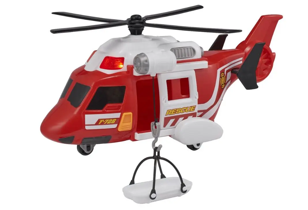 Czerwony i biały helikopter ratunkowy zabawka z noszami wiszącymi na haku.