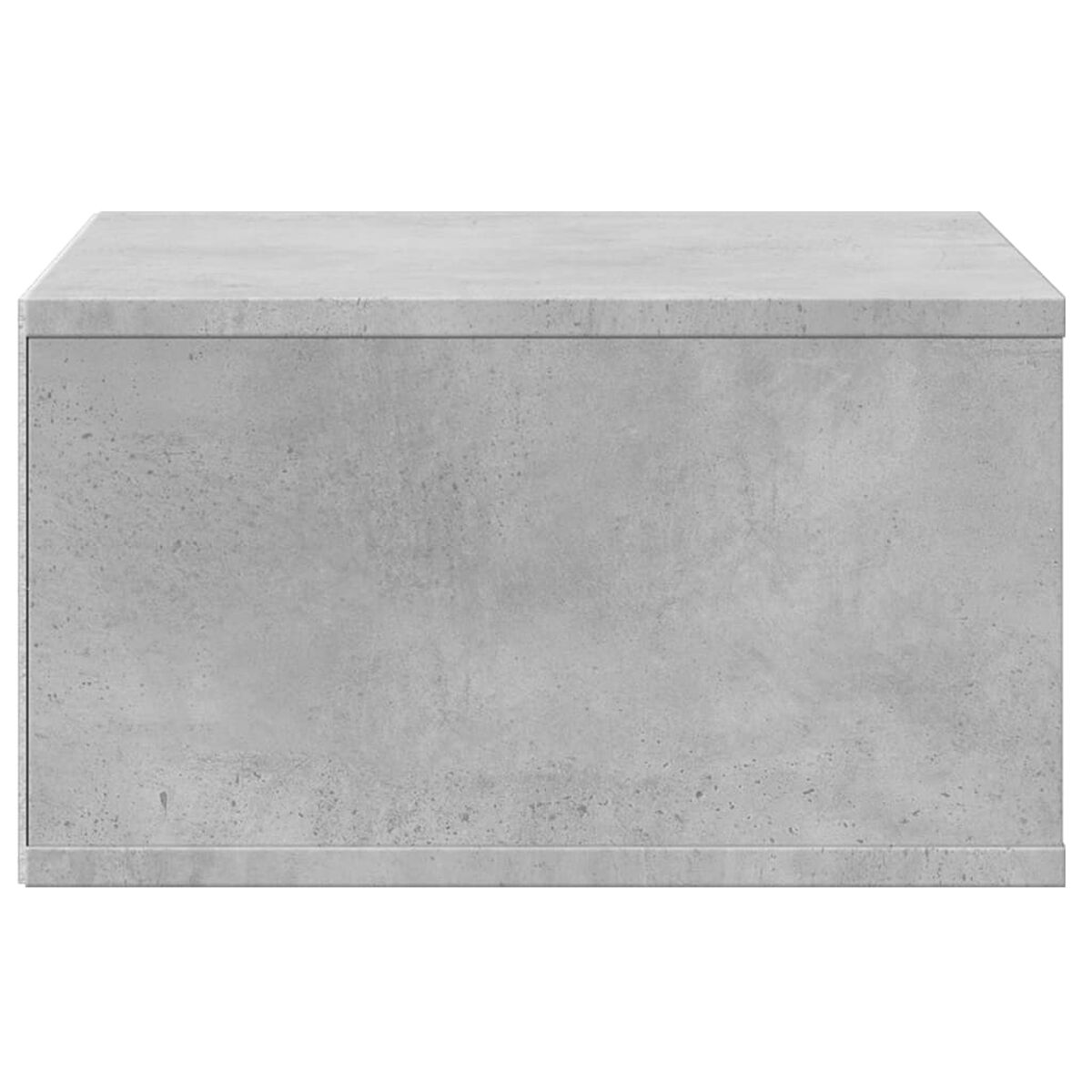 Ein grauer Betonwürfel mit glatter Oberfläche und leicht unregelmäßiger Textur.