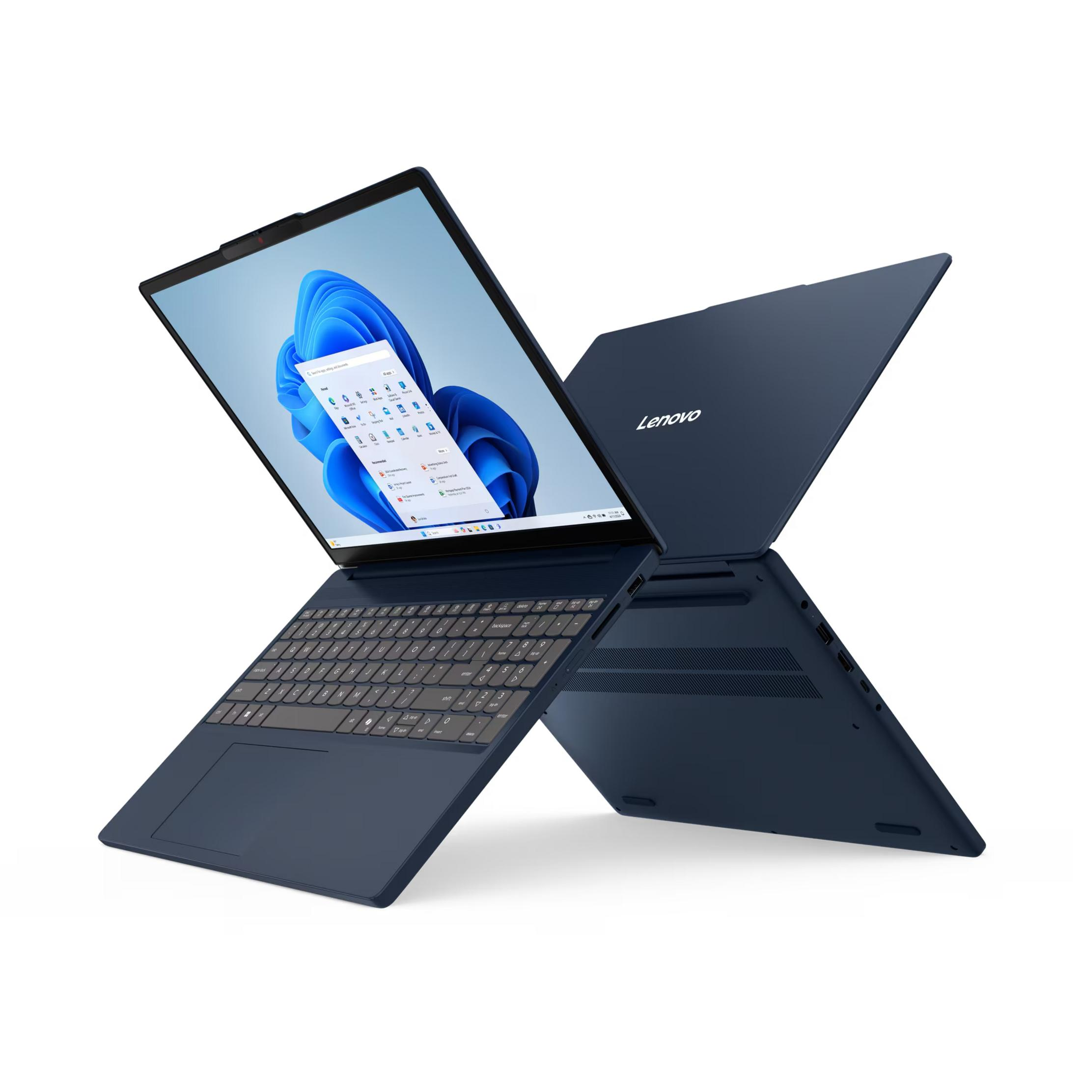 Un portátil Lenovo azul oscuro está abierto, mostrando teclado y pantalla. Fondo blanco.