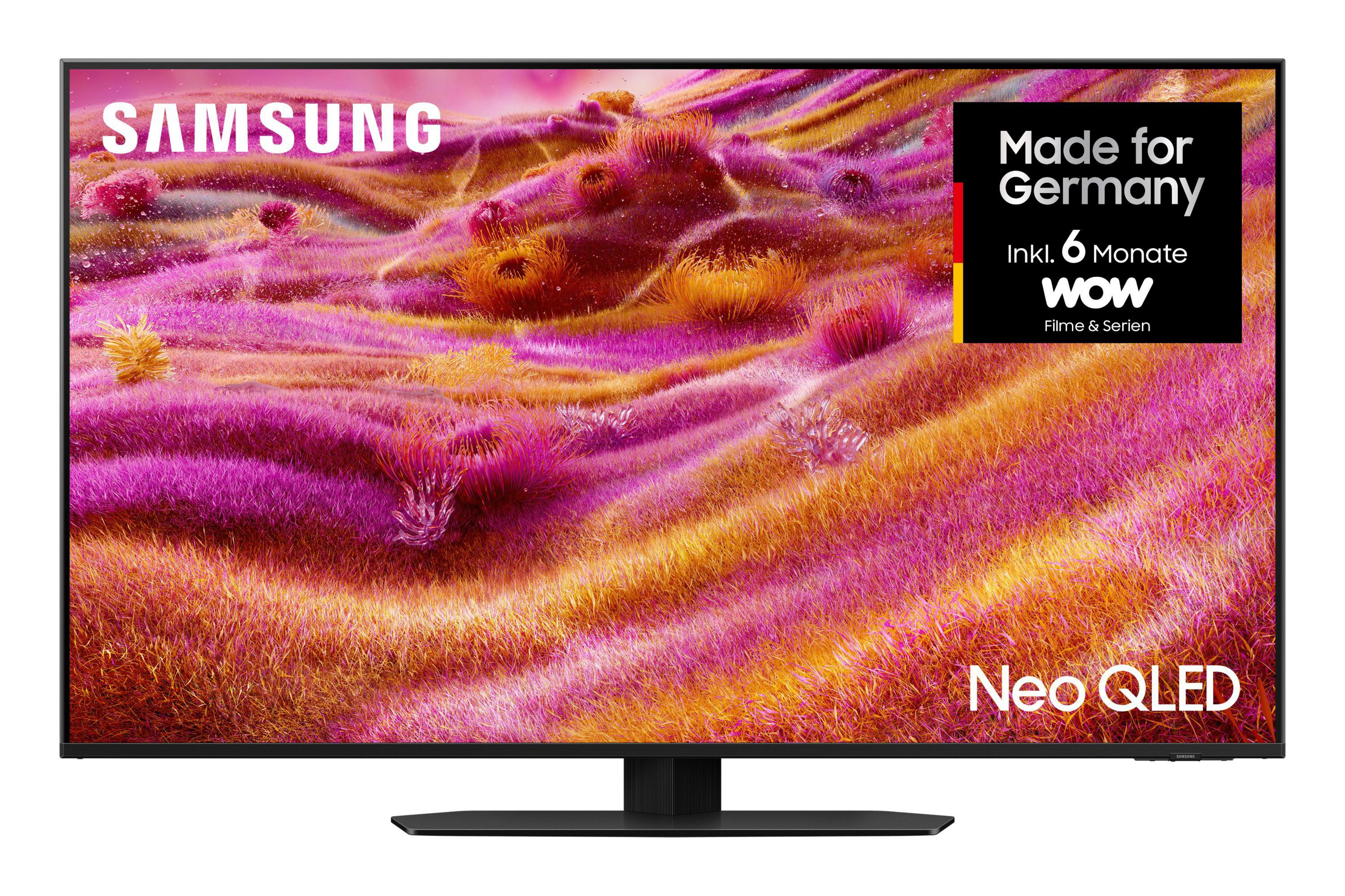 Samsung Neo QLED TV mit farbenfrohem, abstrakten Hintergrund und "Made for Germany"-Logo.