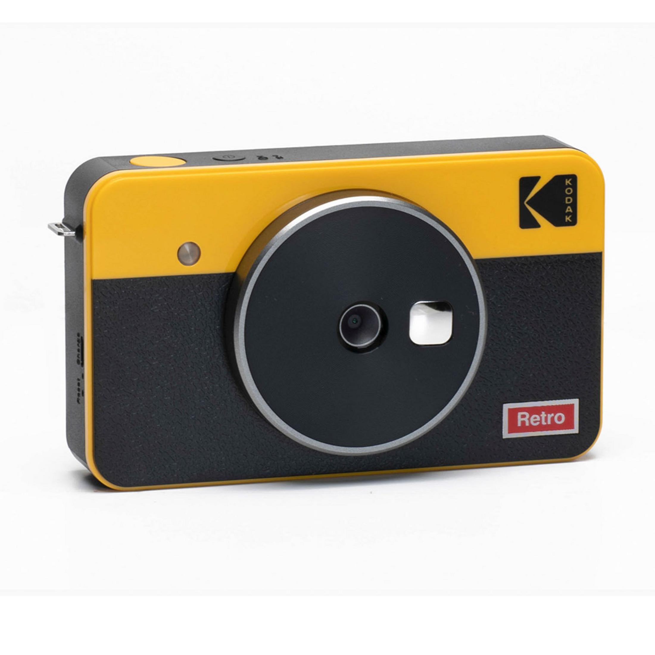 Una fotocamera Kodak retrò gialla e nera con grande obiettivo nero ed etichetta 'Retro' rossa.
