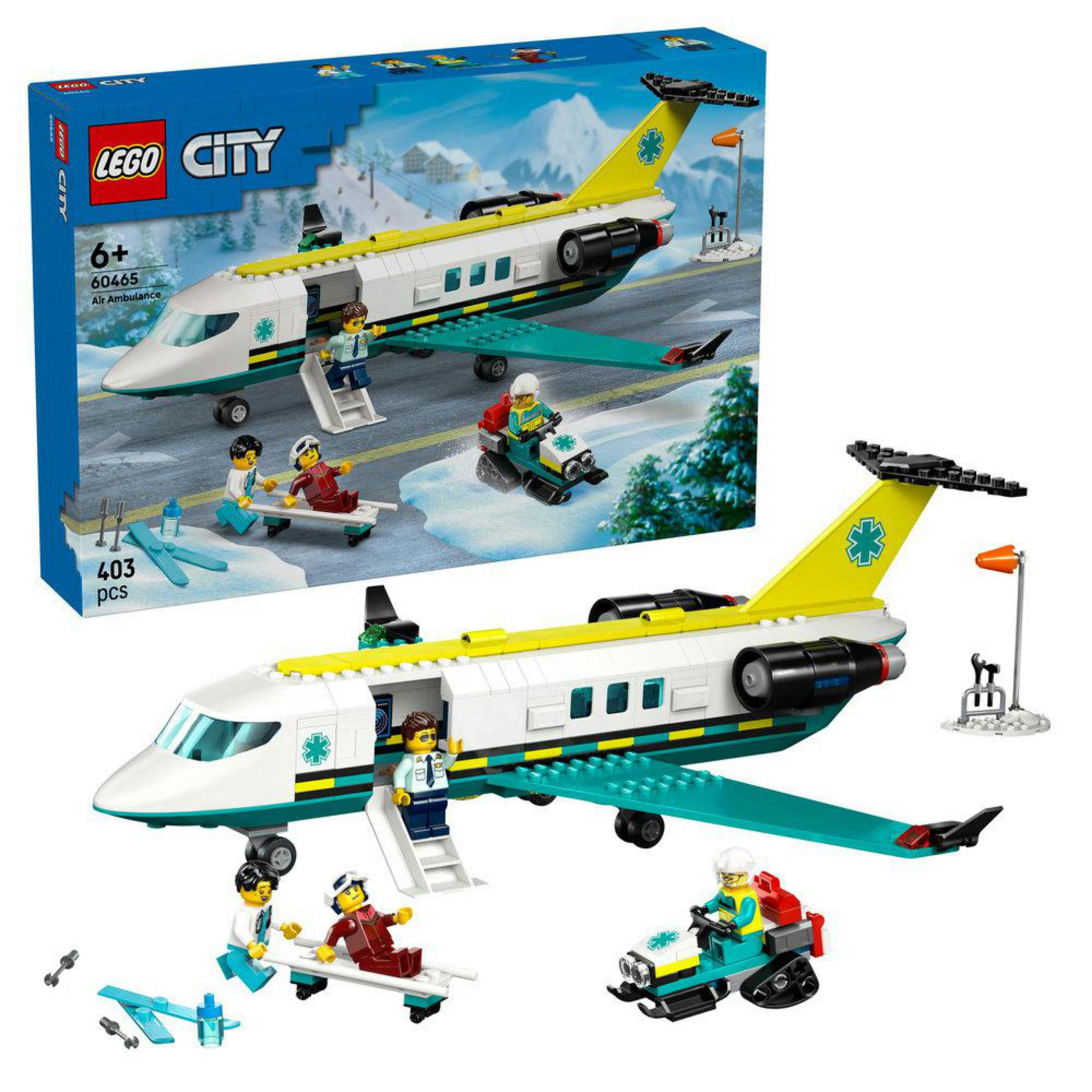 Aereo ambulanza Lego City con figure, barella, motoslitta e scatola.