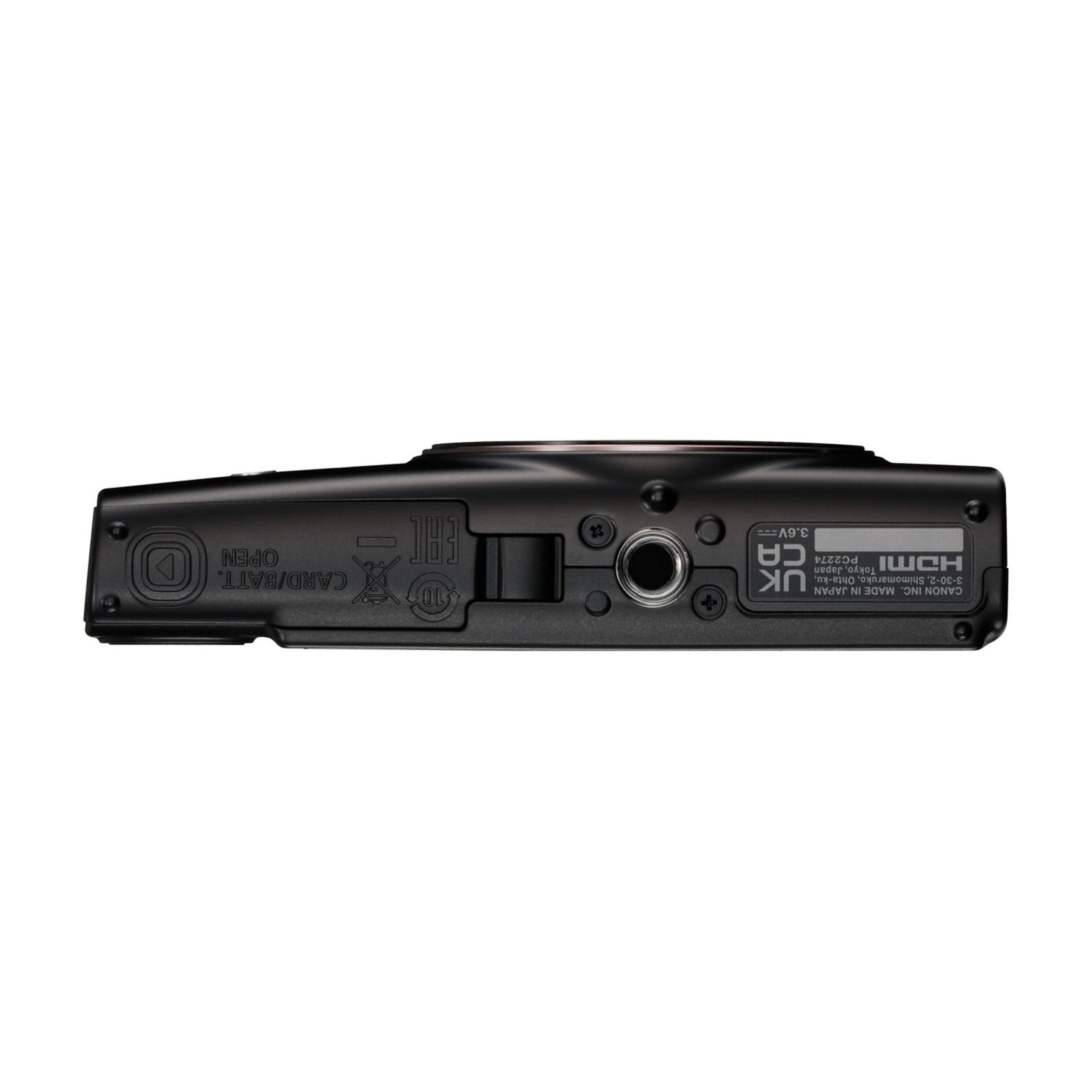 Unterseite einer schwarzen Digitalkamera mit Beschriftungen und Anschlüssen.