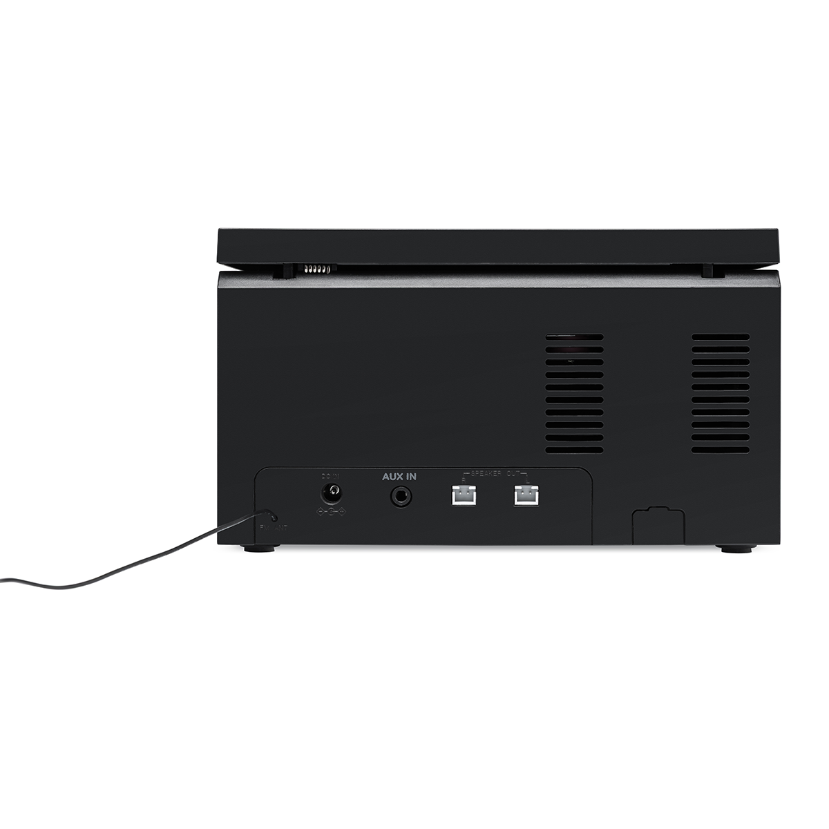 Widok z tyłu czarnego urządzenia elektronicznego pokazujący porty DC IN, AUX IN i SPEAKER OUT.