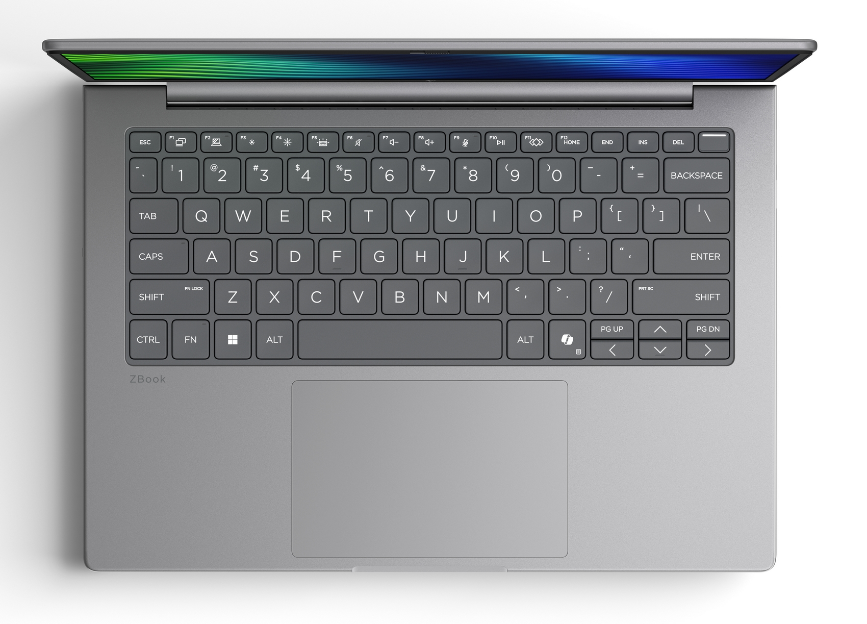 Laptop grigio con tastiera e schermo illuminato.