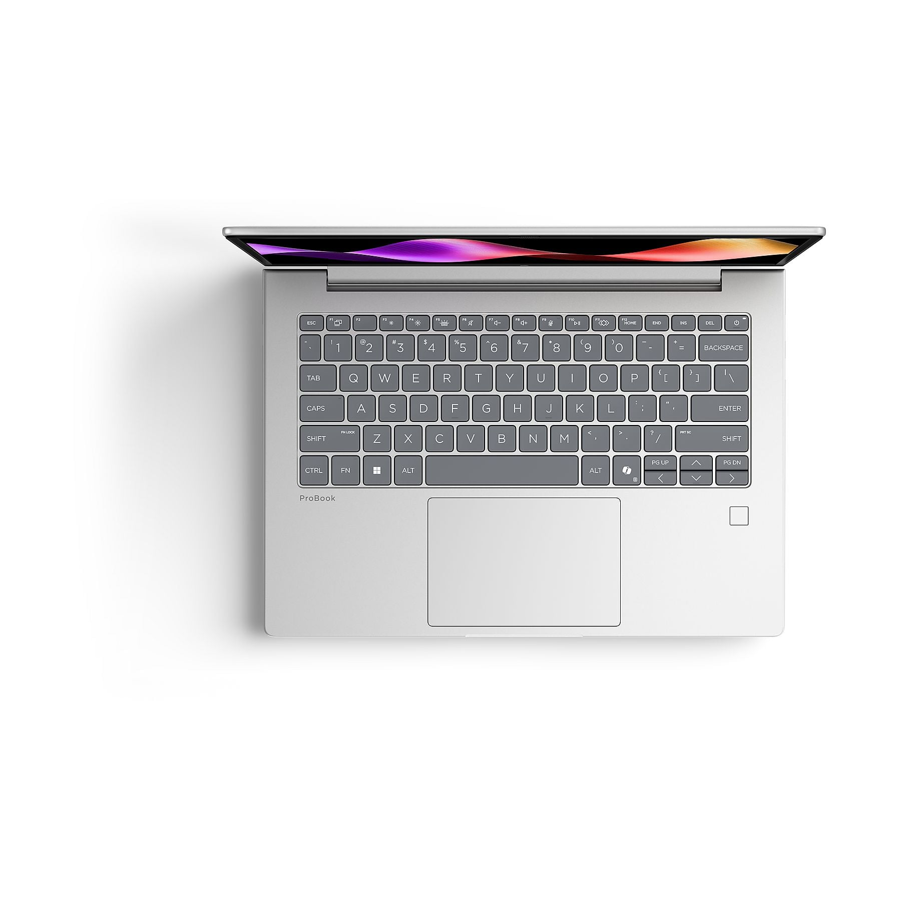 Un laptop argentato aperto con tastiera illuminata e motivo viola sullo schermo.
