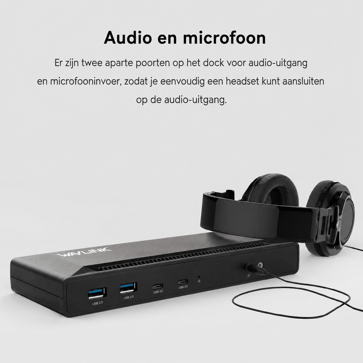 Black dock with headphones and USB ports.