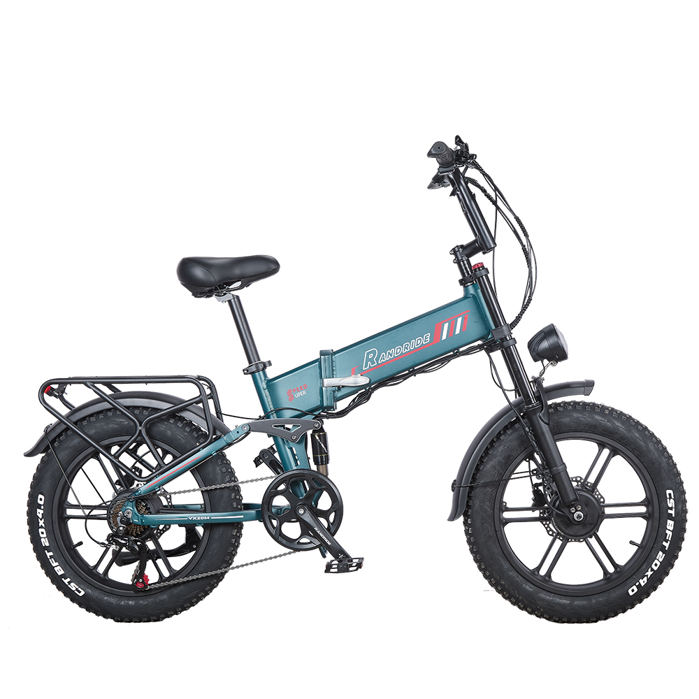 Ein türkisfarbenes faltbares Elektrofahrrad mit dicken Reifen, Gepäckträger hinten und Scheinwerfer.