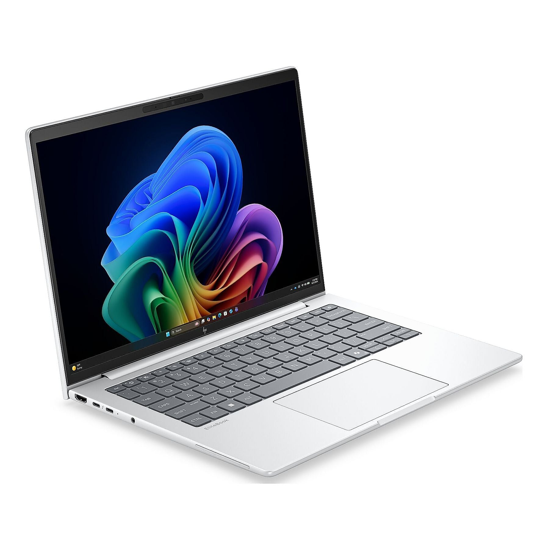 Un laptop argentato che mostra uno sfondo colorato sul suo schermo.