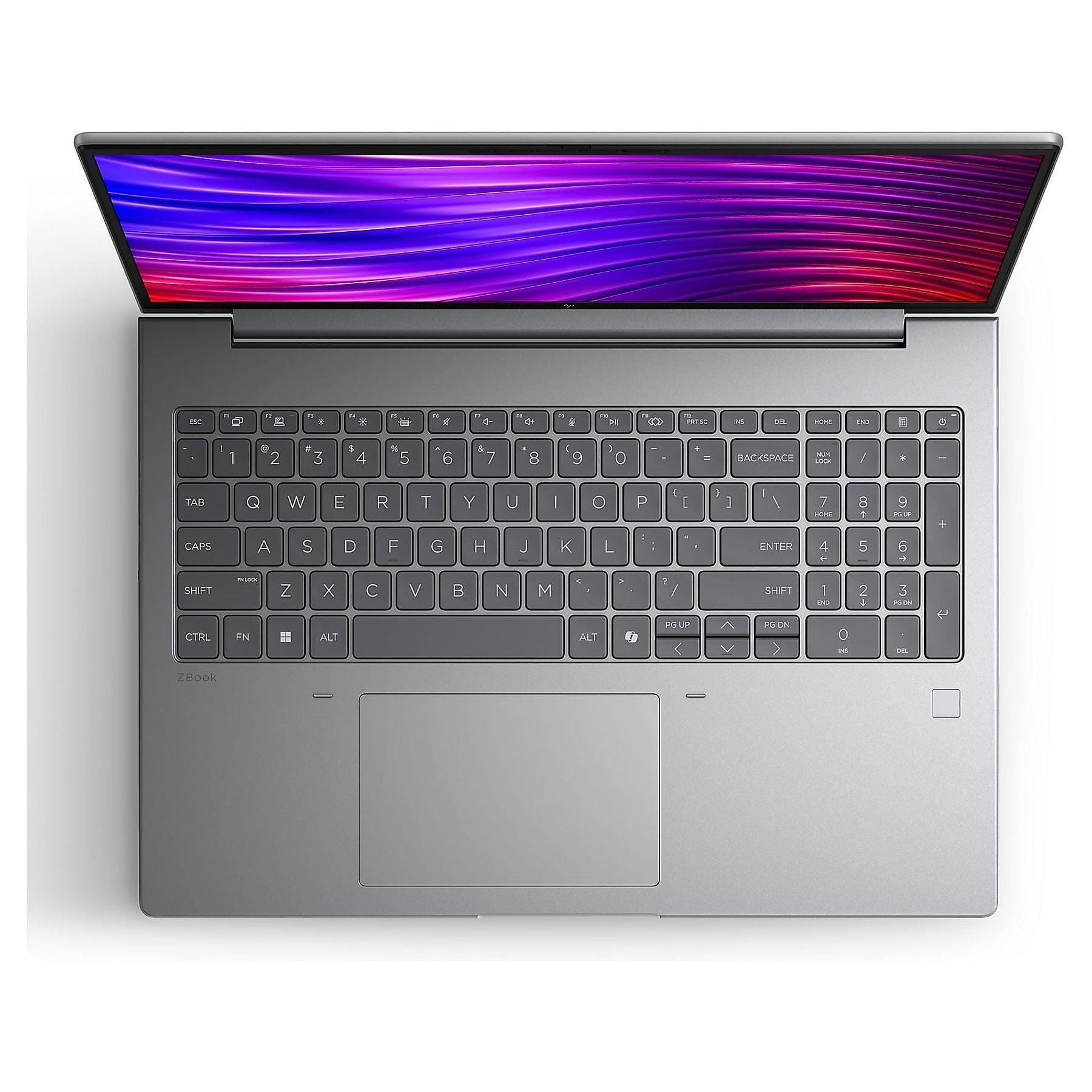 Laptop argentato con coperchio aperto, tastiera e schermo illuminati.