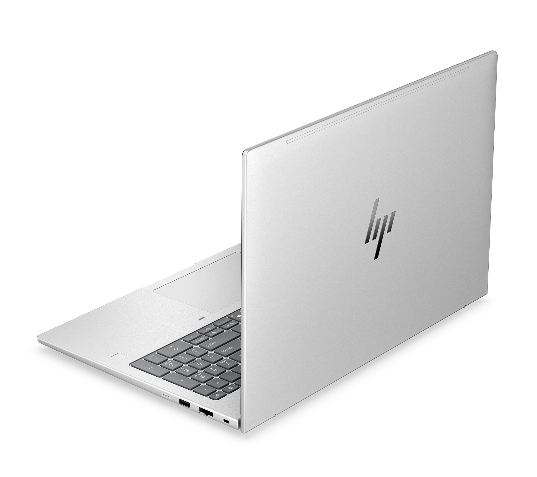 Un laptop HP argentato con tastiera retroilluminata e logo.