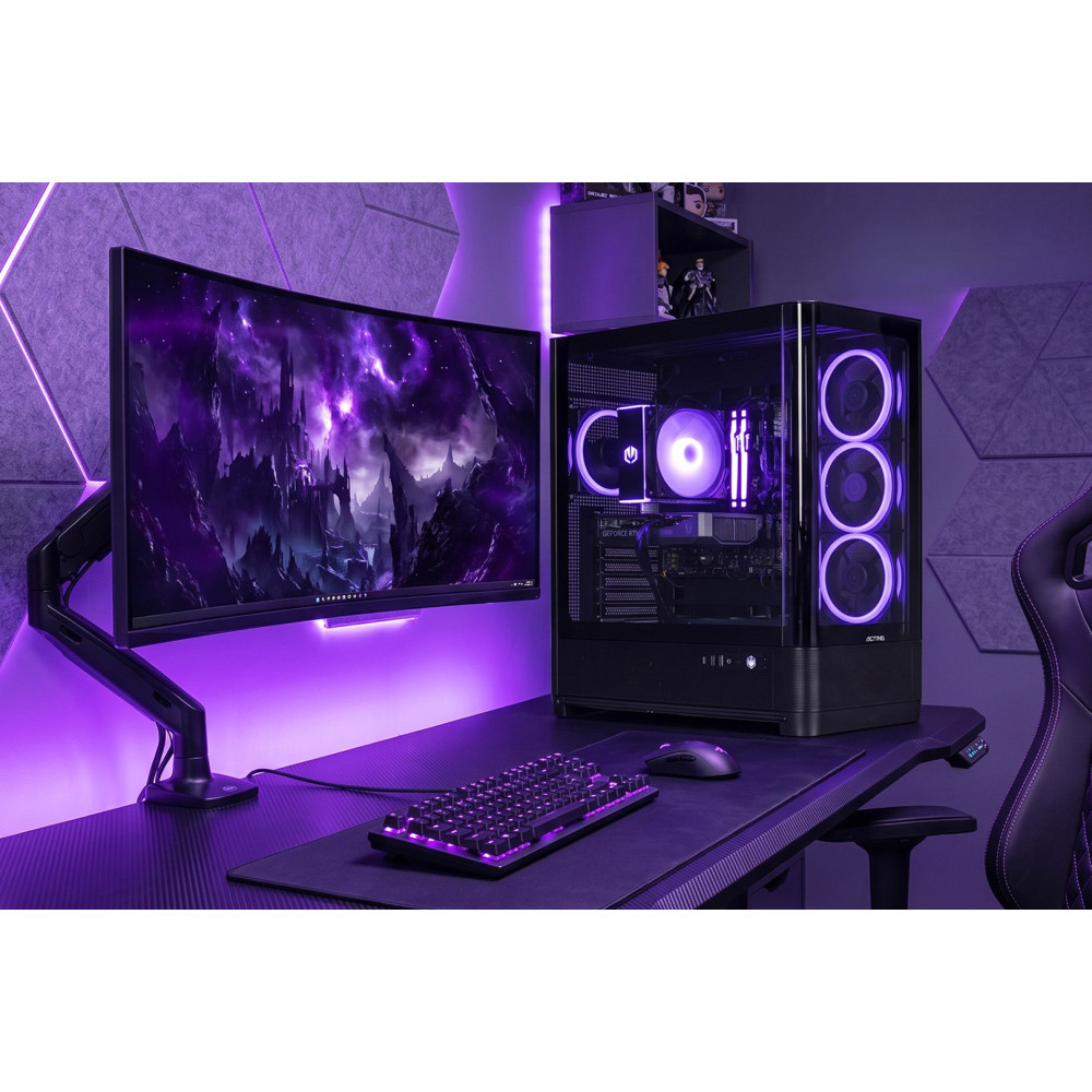 Una postazione PC da gaming con monitor curvo, tastiera e mouse illuminati da luci viola.