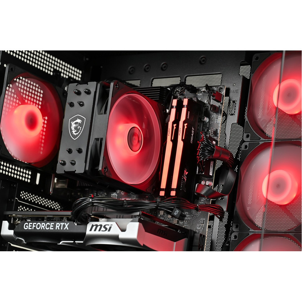 Un PC aperto che mostra ventole rosse, dissipatore CPU, RAM e scheda grafica.