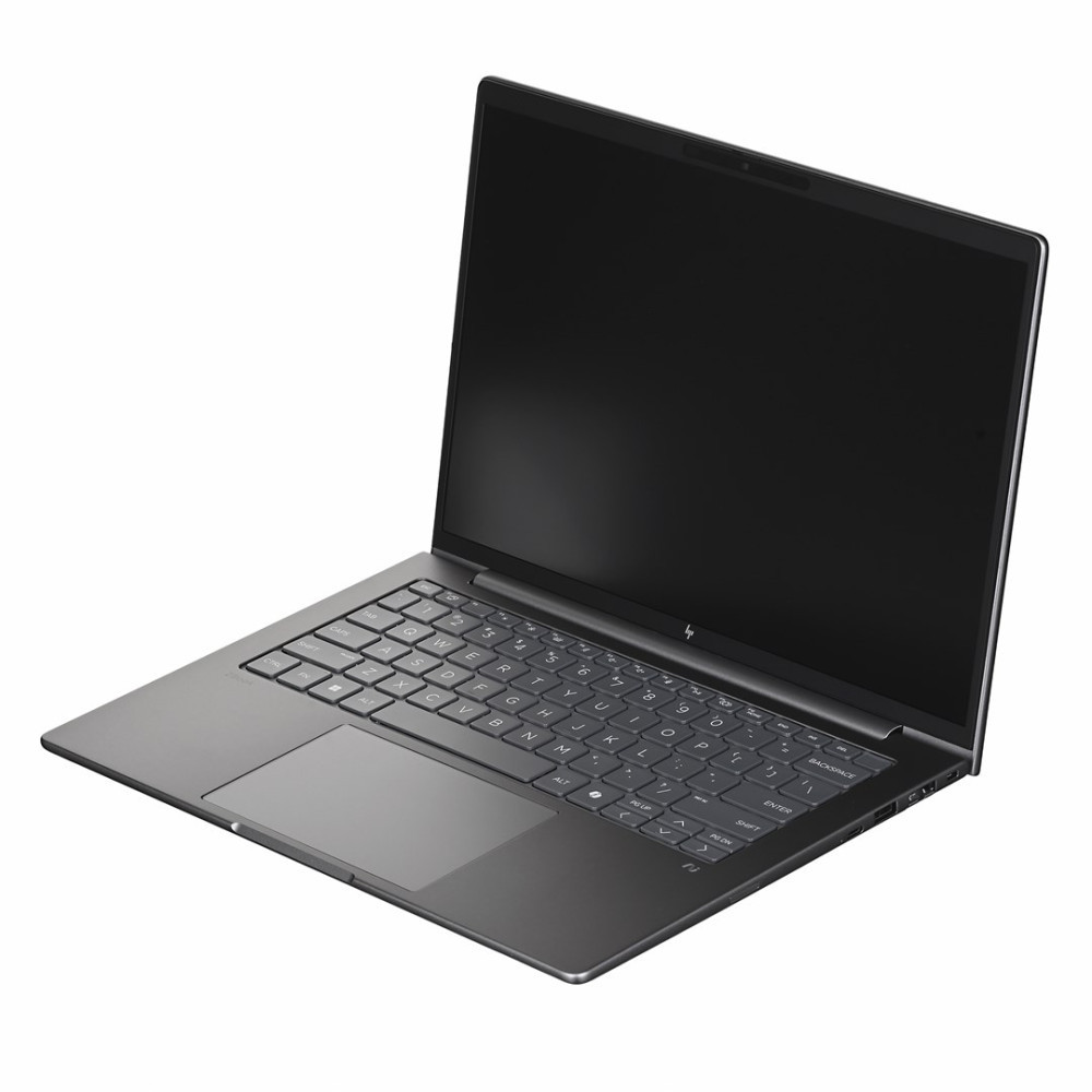 Zamknięty, ciemny laptop z podświetlaną klawiaturą na białym tle.