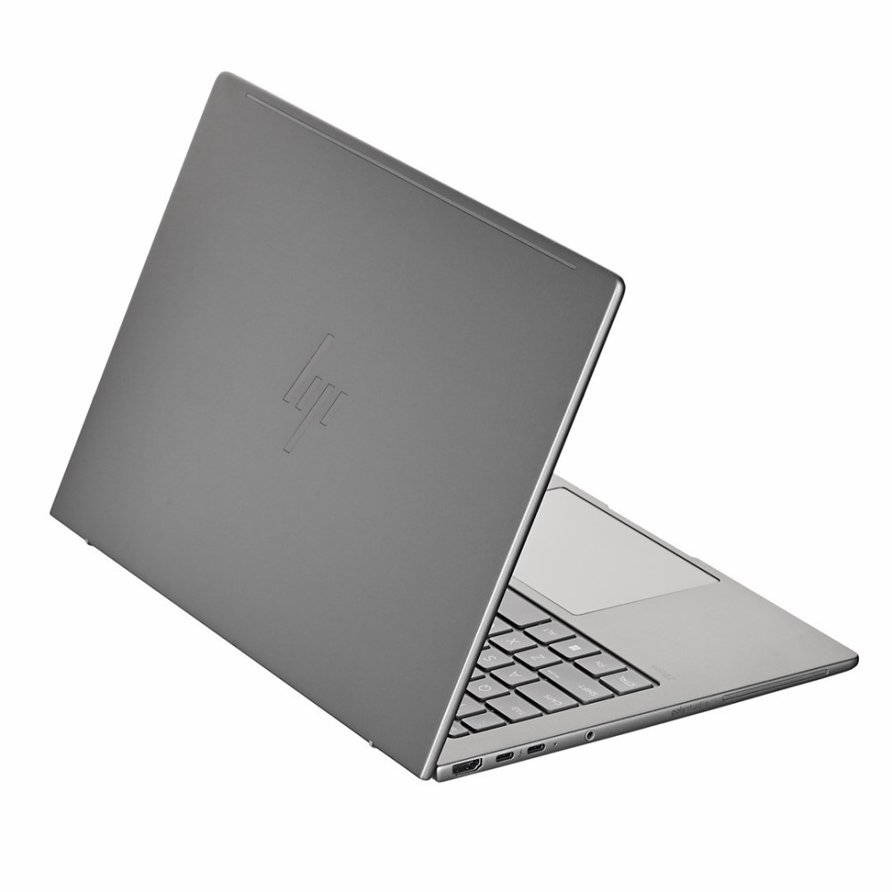 Zamknięty srebrny laptop z logo HP na pokrywie.