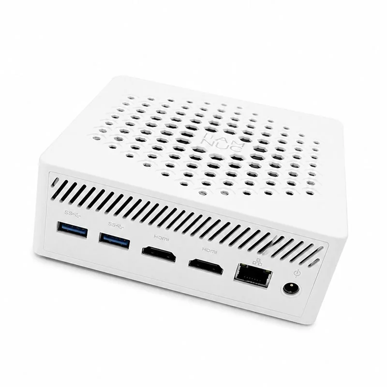 Mini PC blanco con orificios de ventilación arriba y lados. Puertos: USB, HDMI, Ethernet, alimentación.