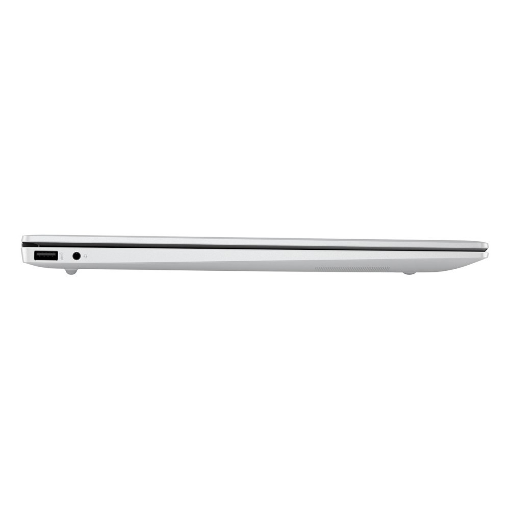 Srebrny laptop w profilu bocznym, pokazujący port USB i gniazdo słuchawkowe.
