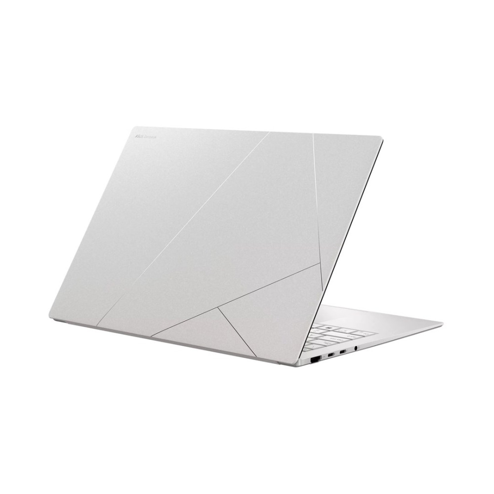 Otwarty srebrny laptop z geometrycznym wzorem na pokrywie.