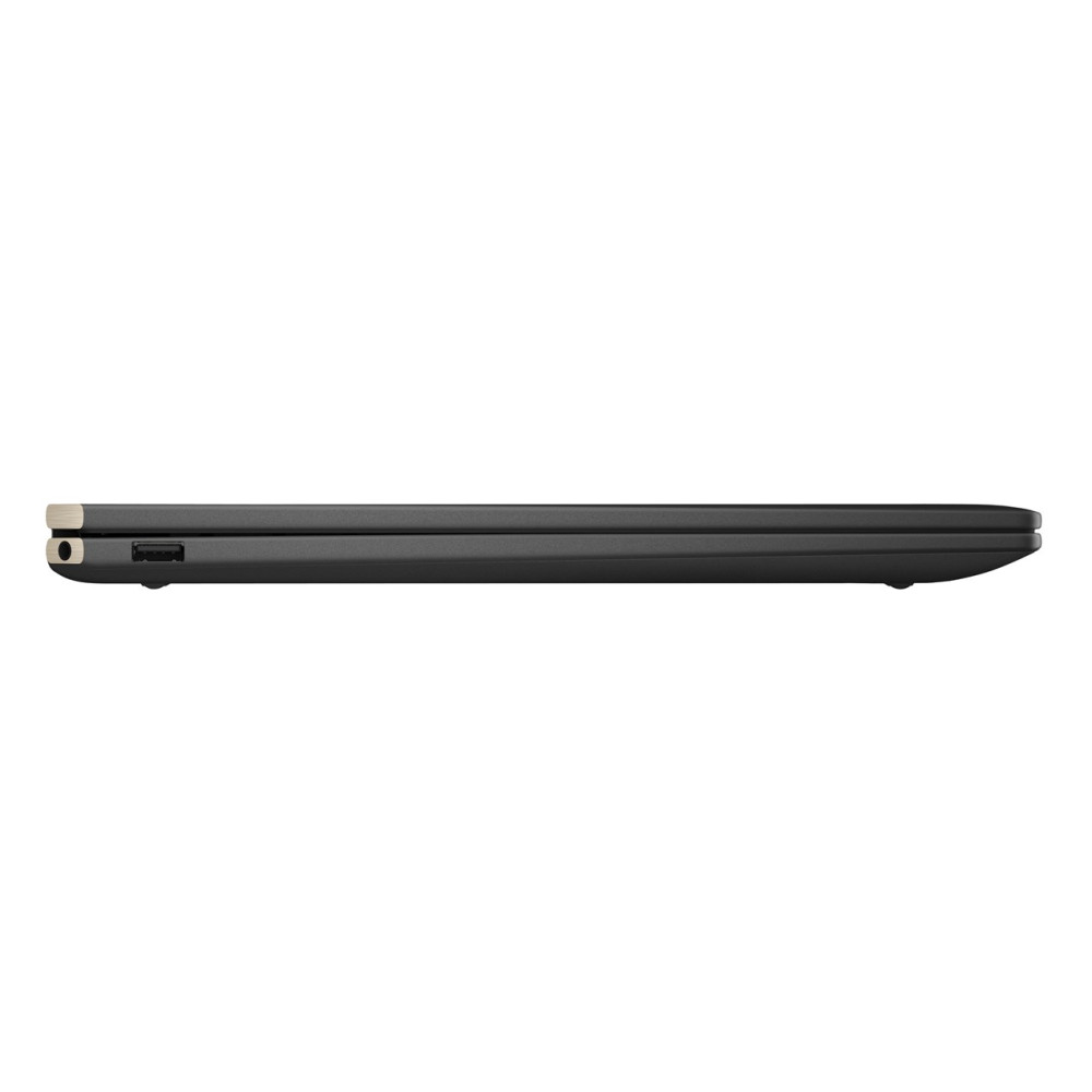 Zamknięty laptop w widoku z profilu, z portami USB i zasilania.