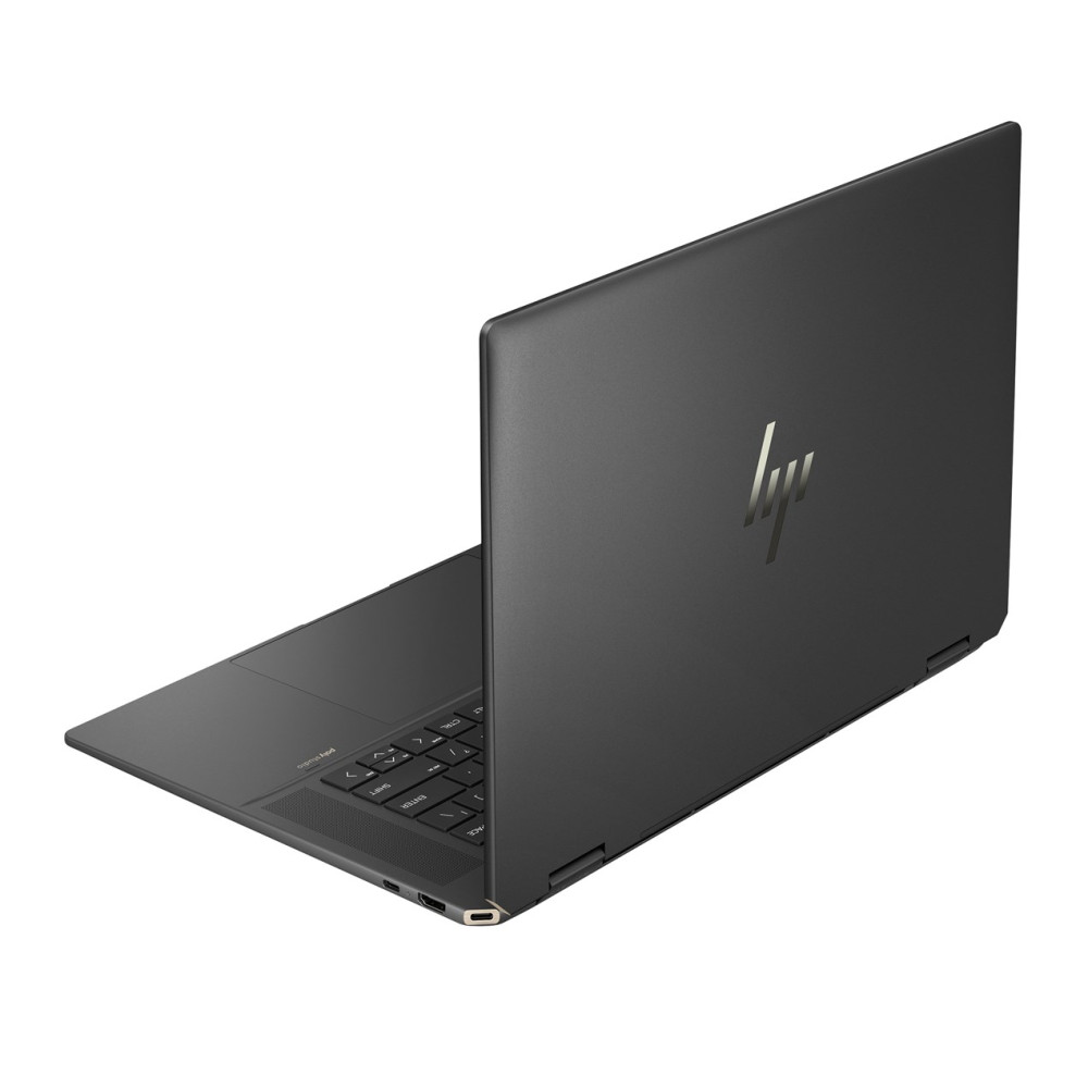Zamknięty, ciemny laptop HP ze srebrnym logo na pokrywie.