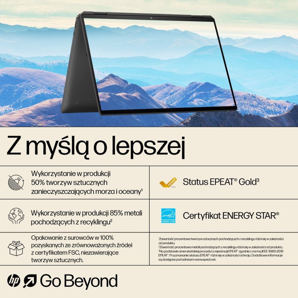 Laptop na tle gór. Informacje o recyklingu i zrównoważonym rozwoju.