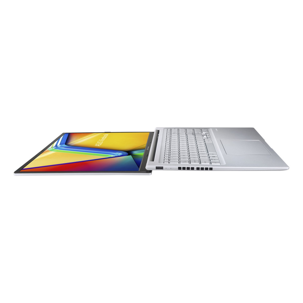 Srebrny laptop otwarty, pokazujący kolorową tapetę na ekranie i klawiaturę.