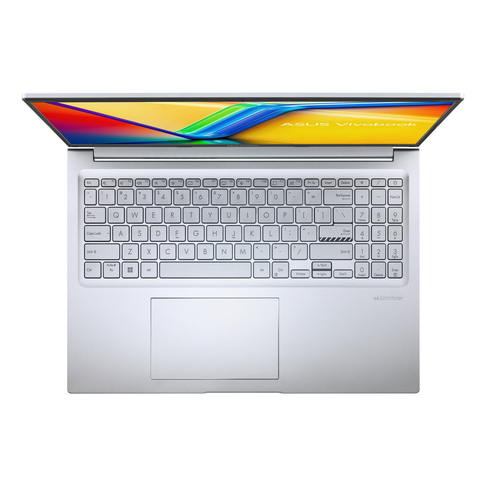 Srebrny laptop z otwartym ekranem, wyświetlający kolorowy obraz i klawiaturę. Białe tło.