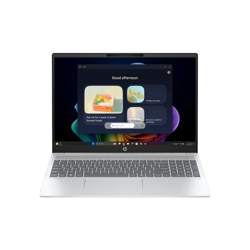 Laptop wyświetlający asystenta AI na ekranie.
