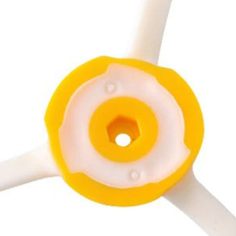 A yellow and white robot vacuum side brush head on a white background.
