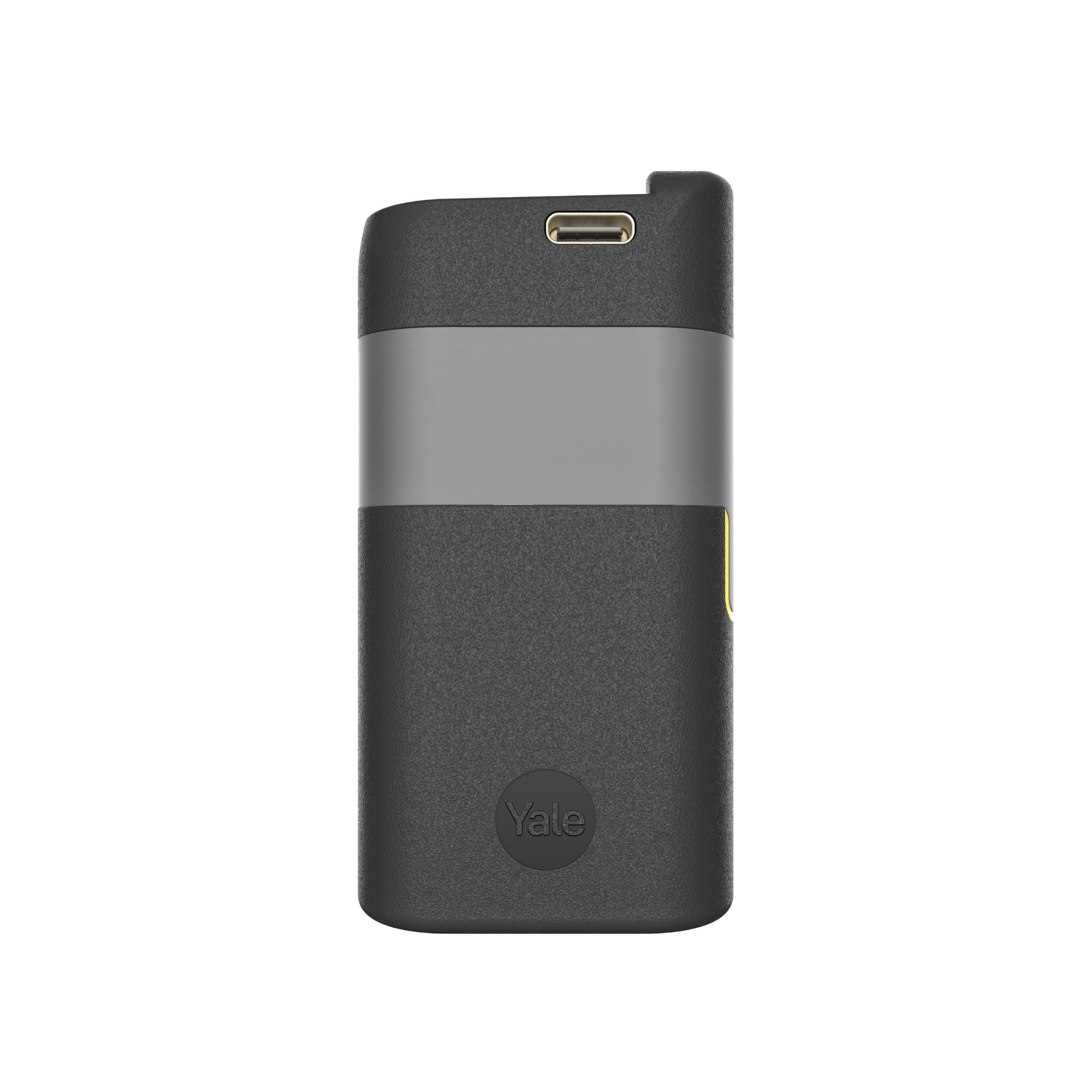 Czarny sprzęt Yale z szarymi paskami i portem USB-C na górze.
